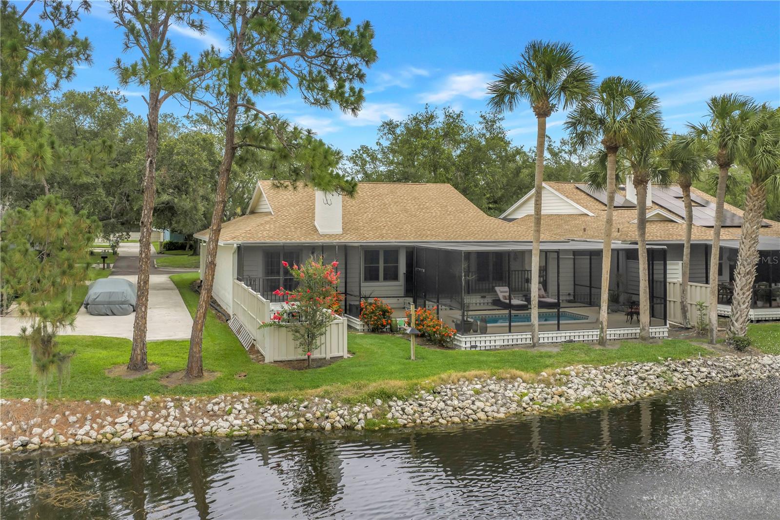 View to lake and fountain, lawn maintained by HOA