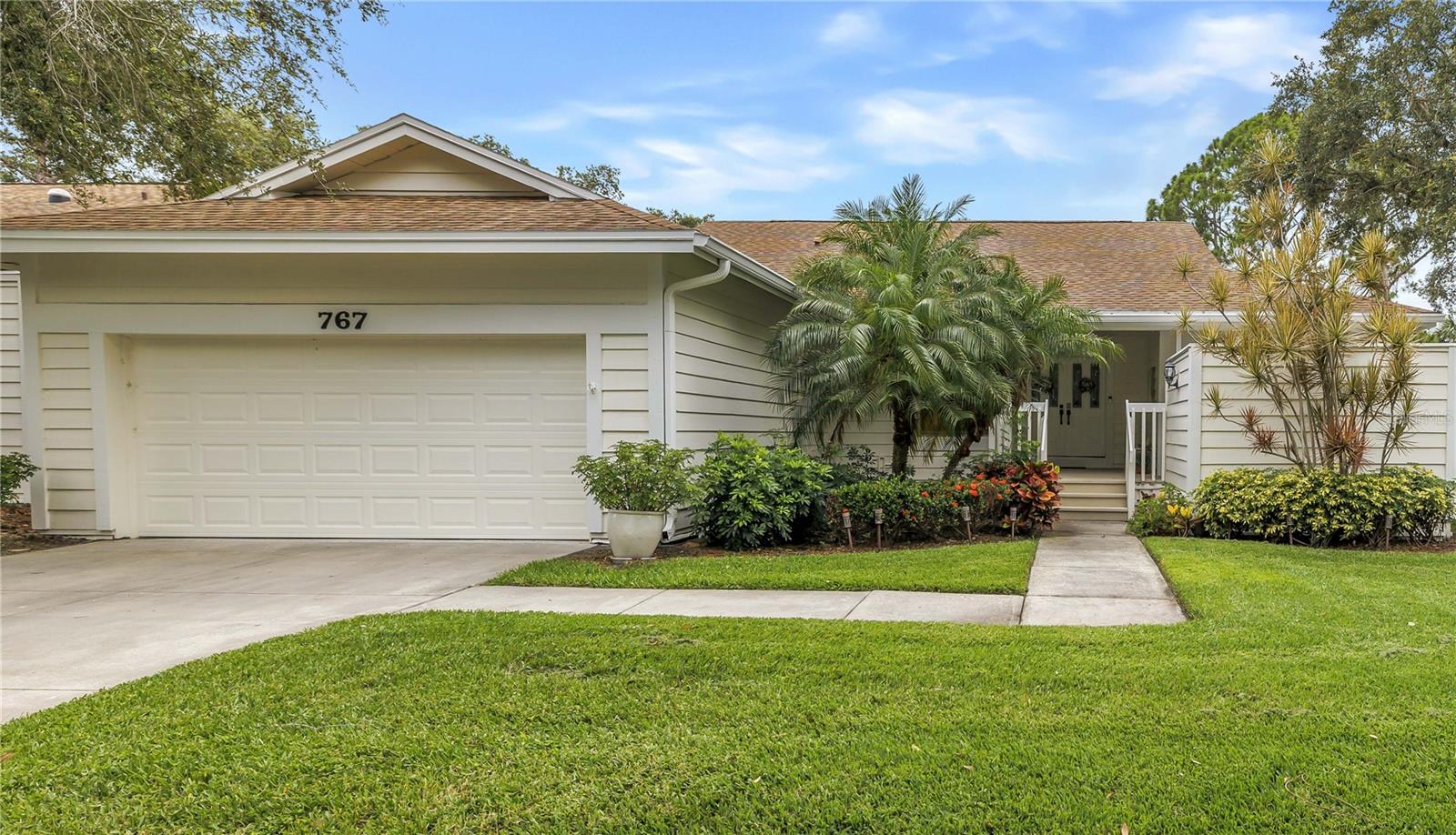 Curb Appeal!! Beautiful worry free landscape, Wide 2-car garage and Driveway, Guest Parking,