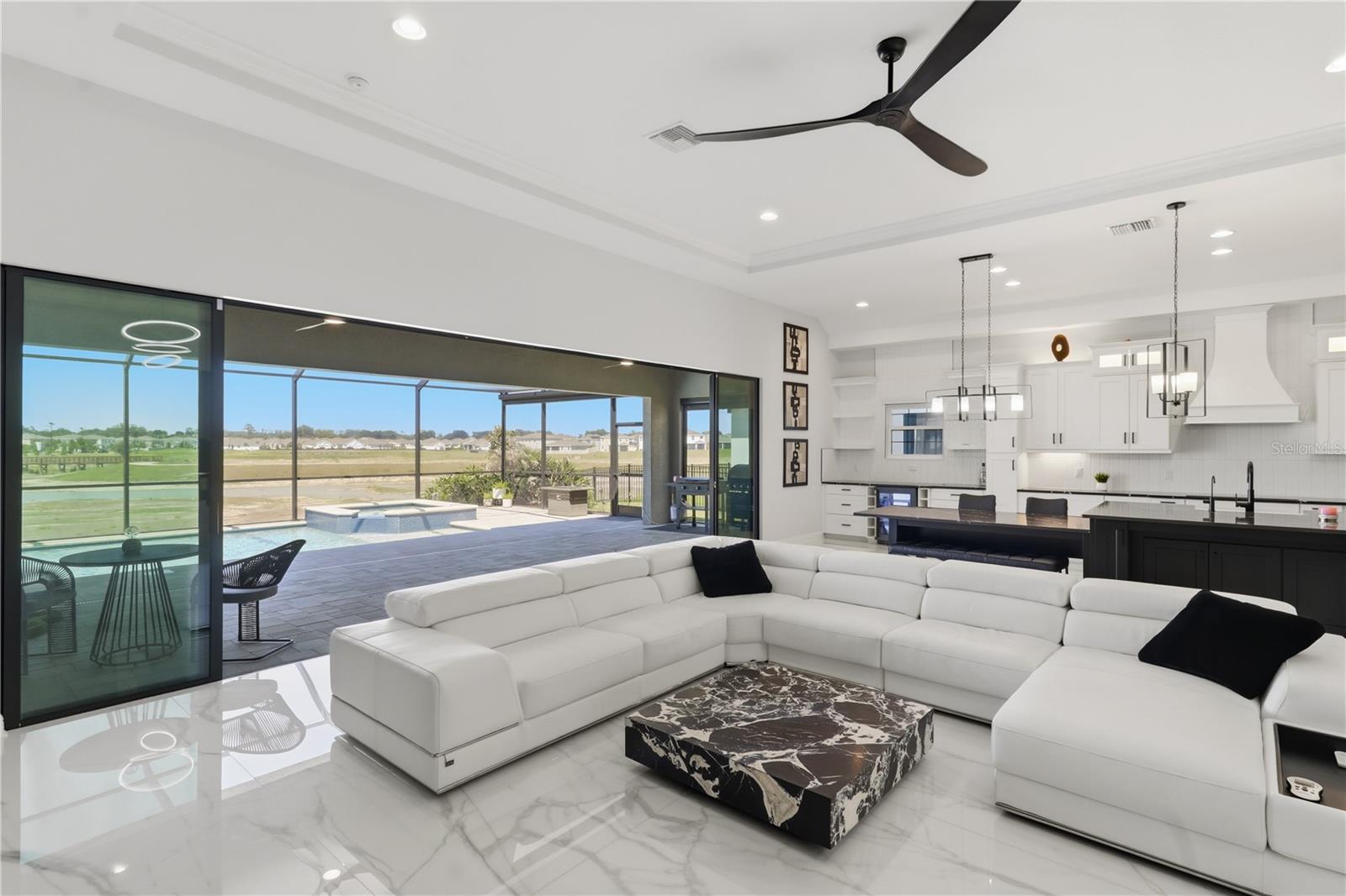 Living room with 8 Panel sliding doors that convert to 2