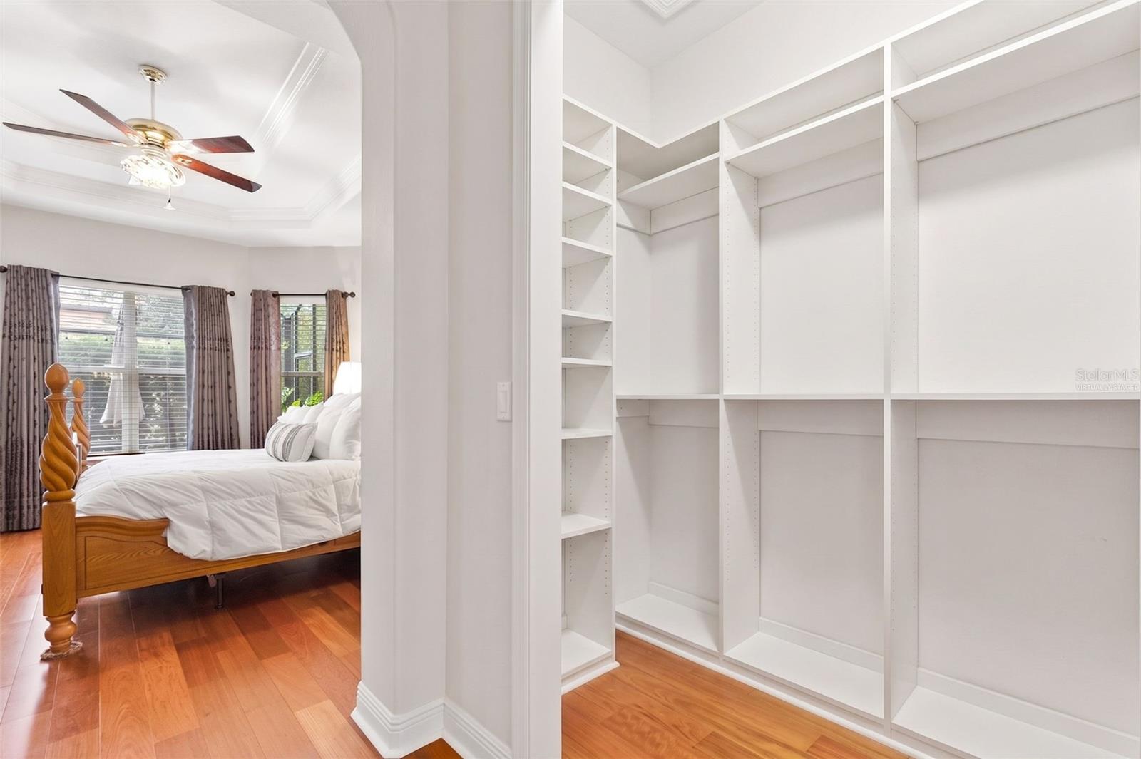 Virtually Staged-Primary Walk-in Custom Closet One