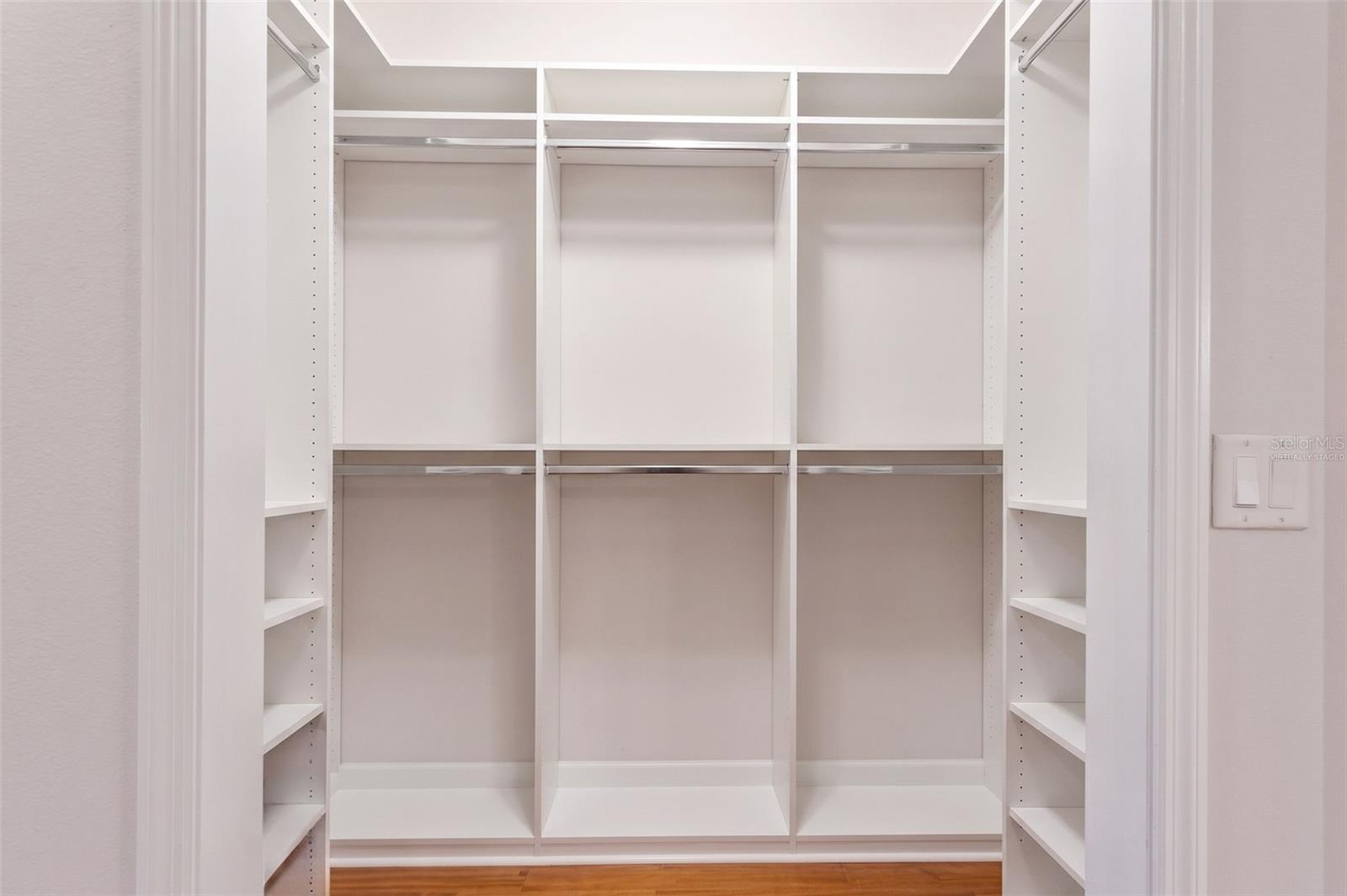 Virtually Staged-Primary Walk-In Custom Closet Two