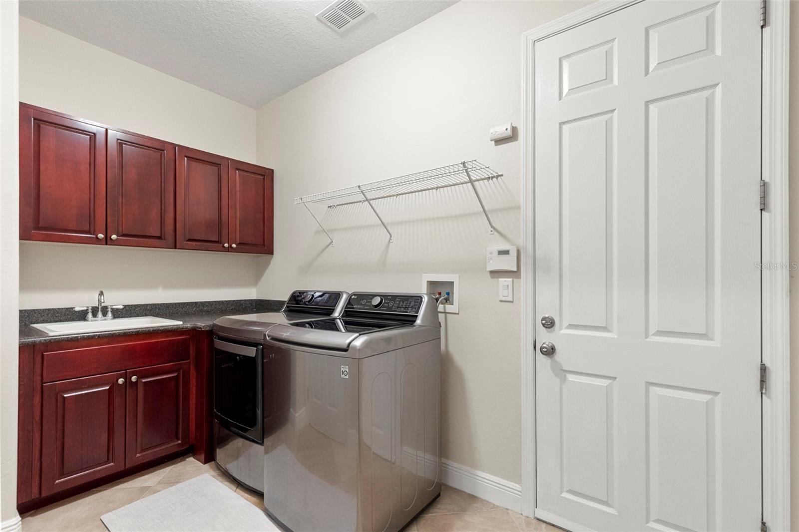 Laundry Room-Expansive Closet, Cabinet Space, Storage Shelves & Utility Sink
