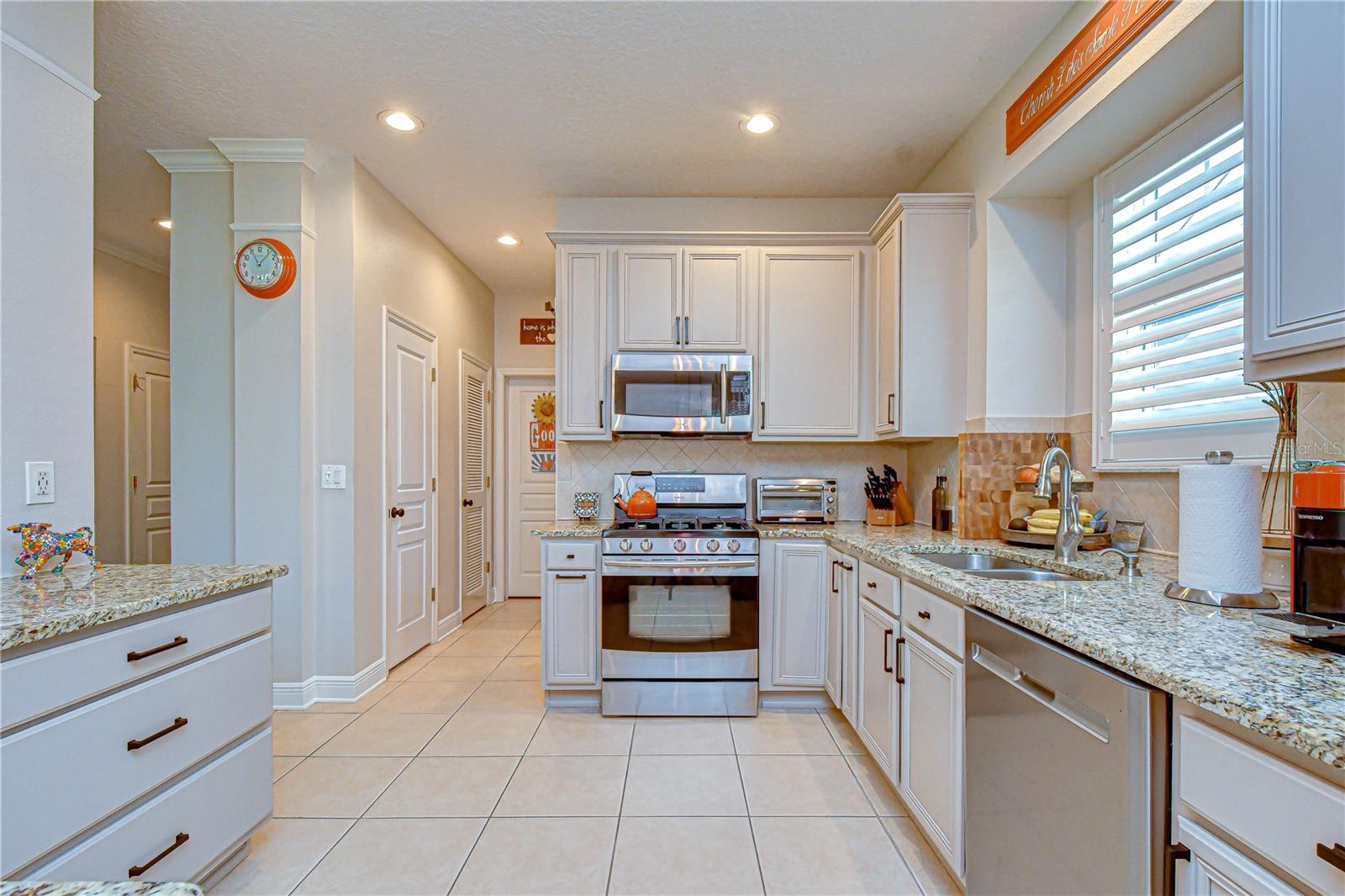 Custom cabinetry featuring upgraded drawer systems designed to maximize organization.