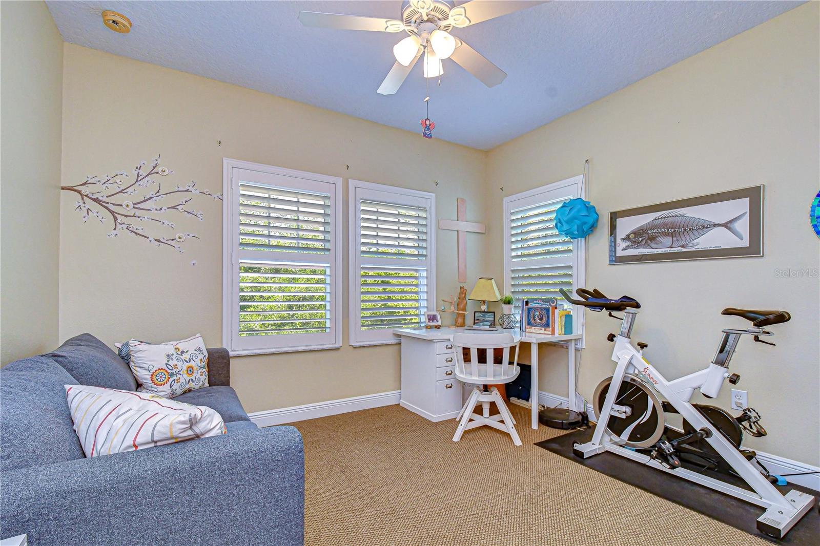 Bright and spacious secondary bedroom or workout space.