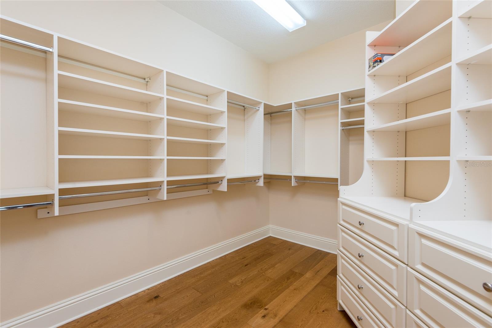 Custom walk-in closet in Primary bedroom suite