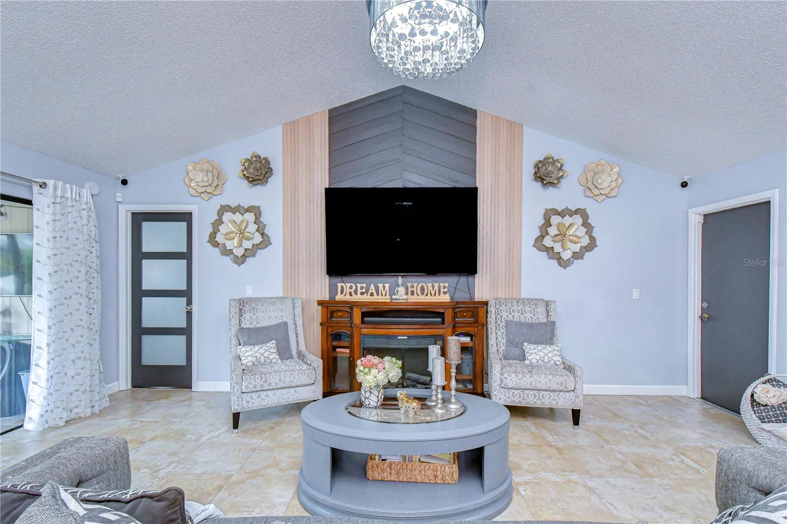 Living room view toward accent wall.