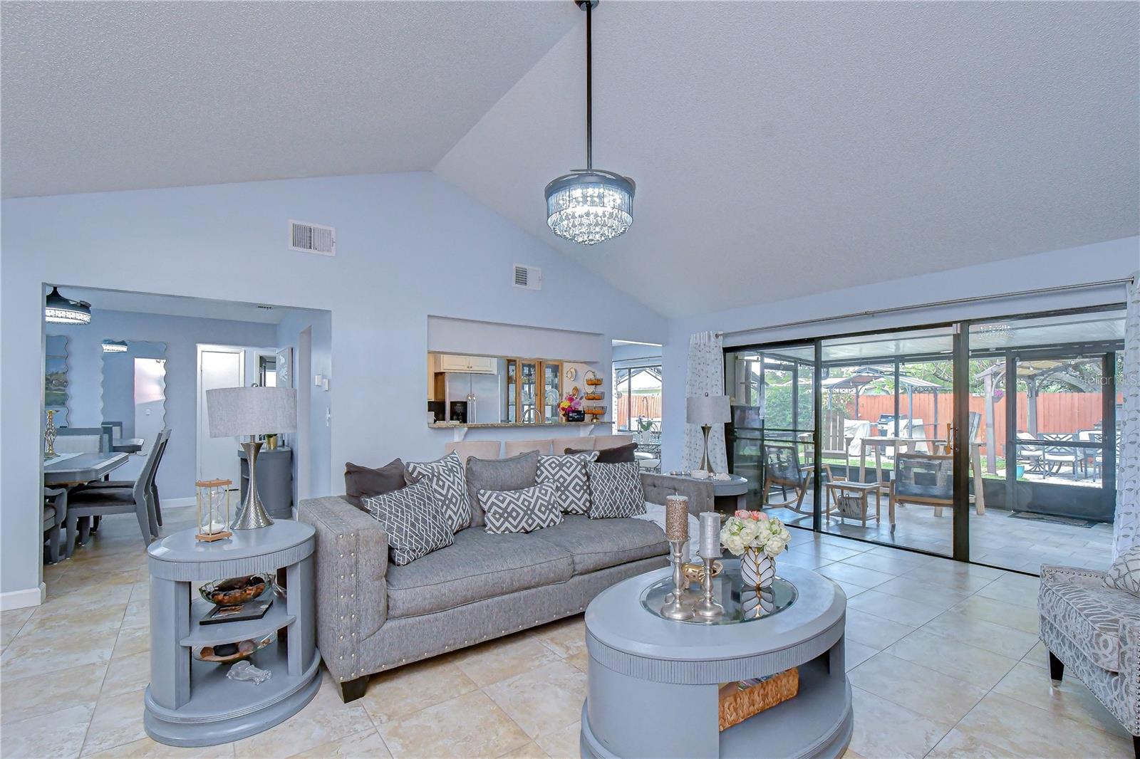 Dining room, kitchen, porch view.