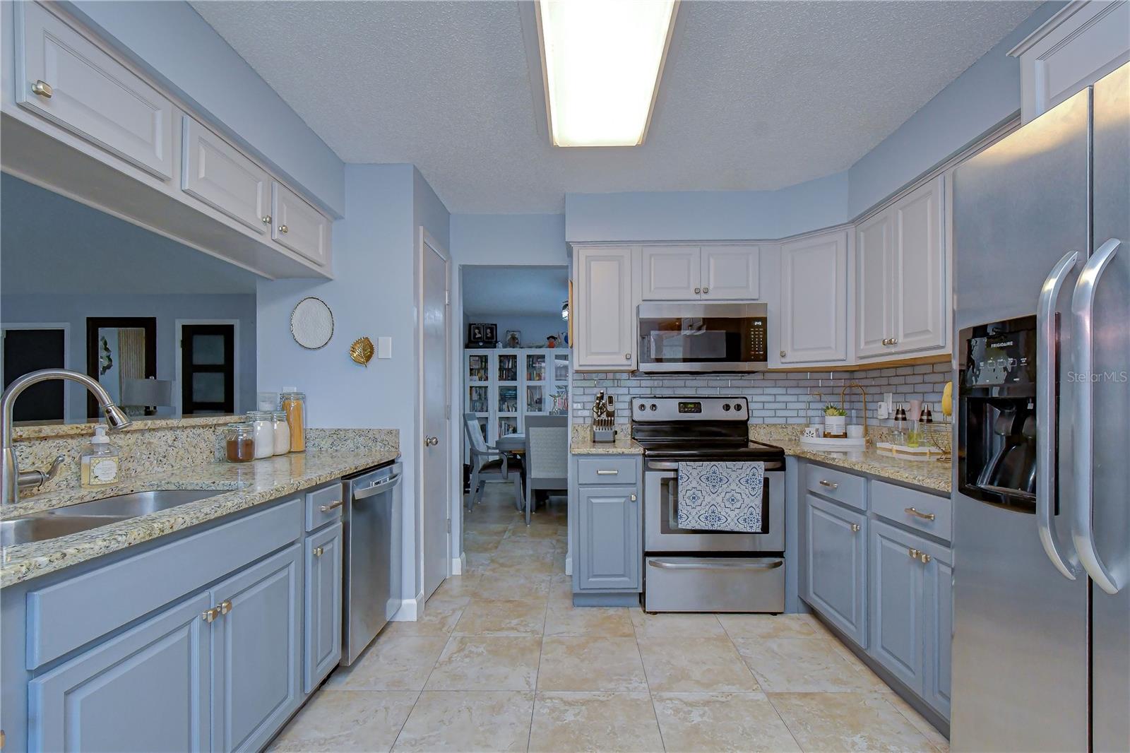 Kitchen view toward dining room