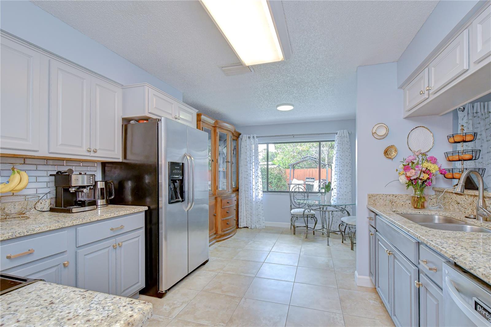 Kitchen boasts granite counter tops, eat in breakfast area