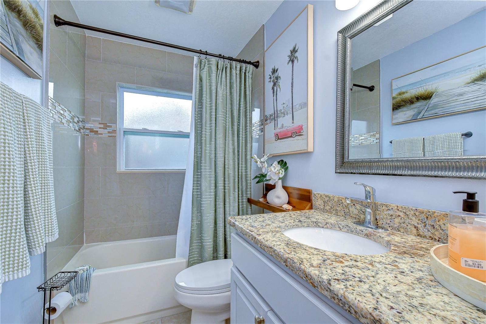 Shower tub combo in bathroom 2