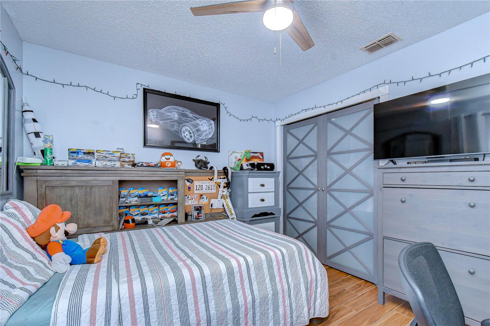 Bedroom 3 with stylish upgraded closet doors.