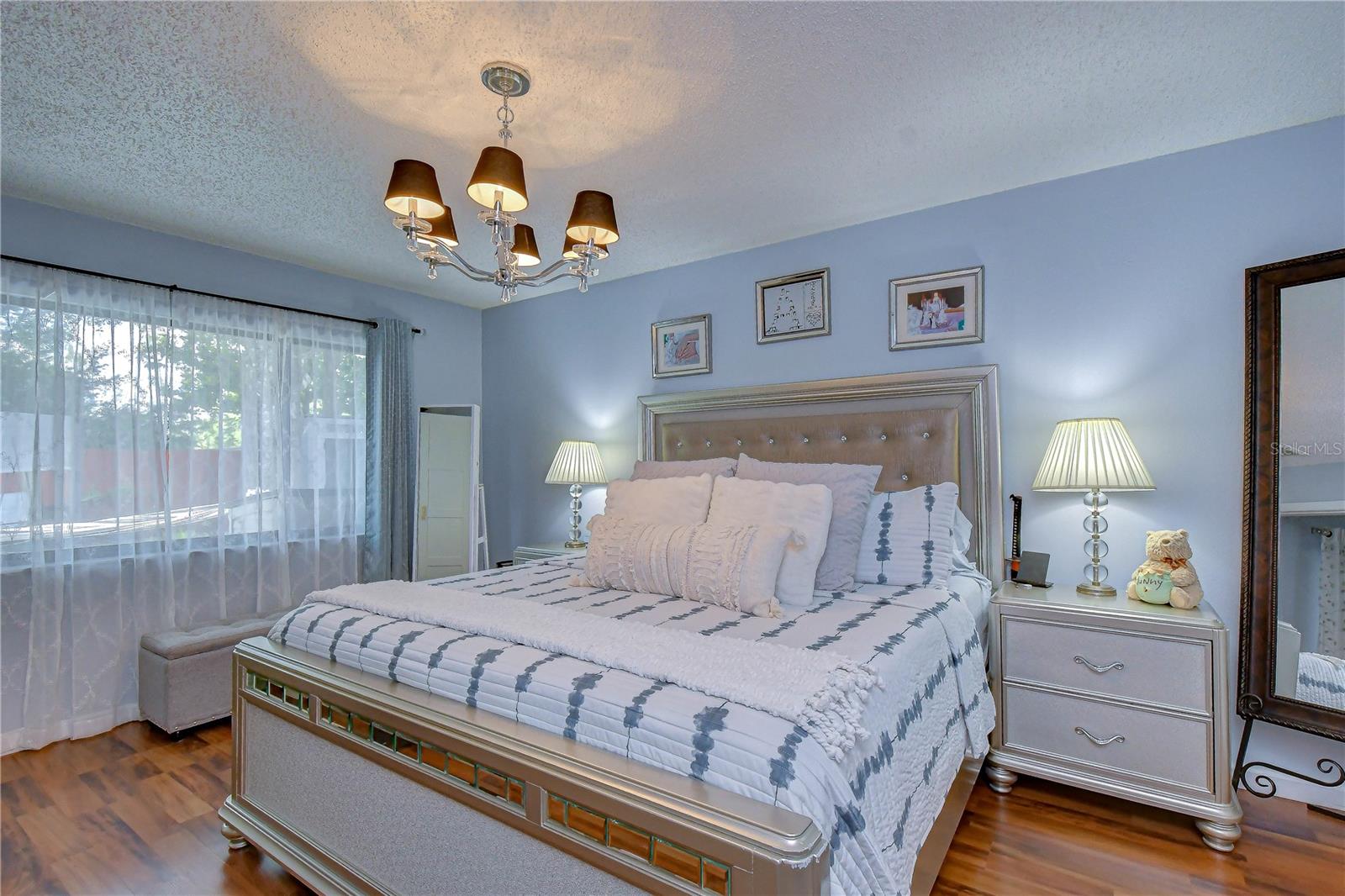 Such a beautiful primary room to come home and relax.