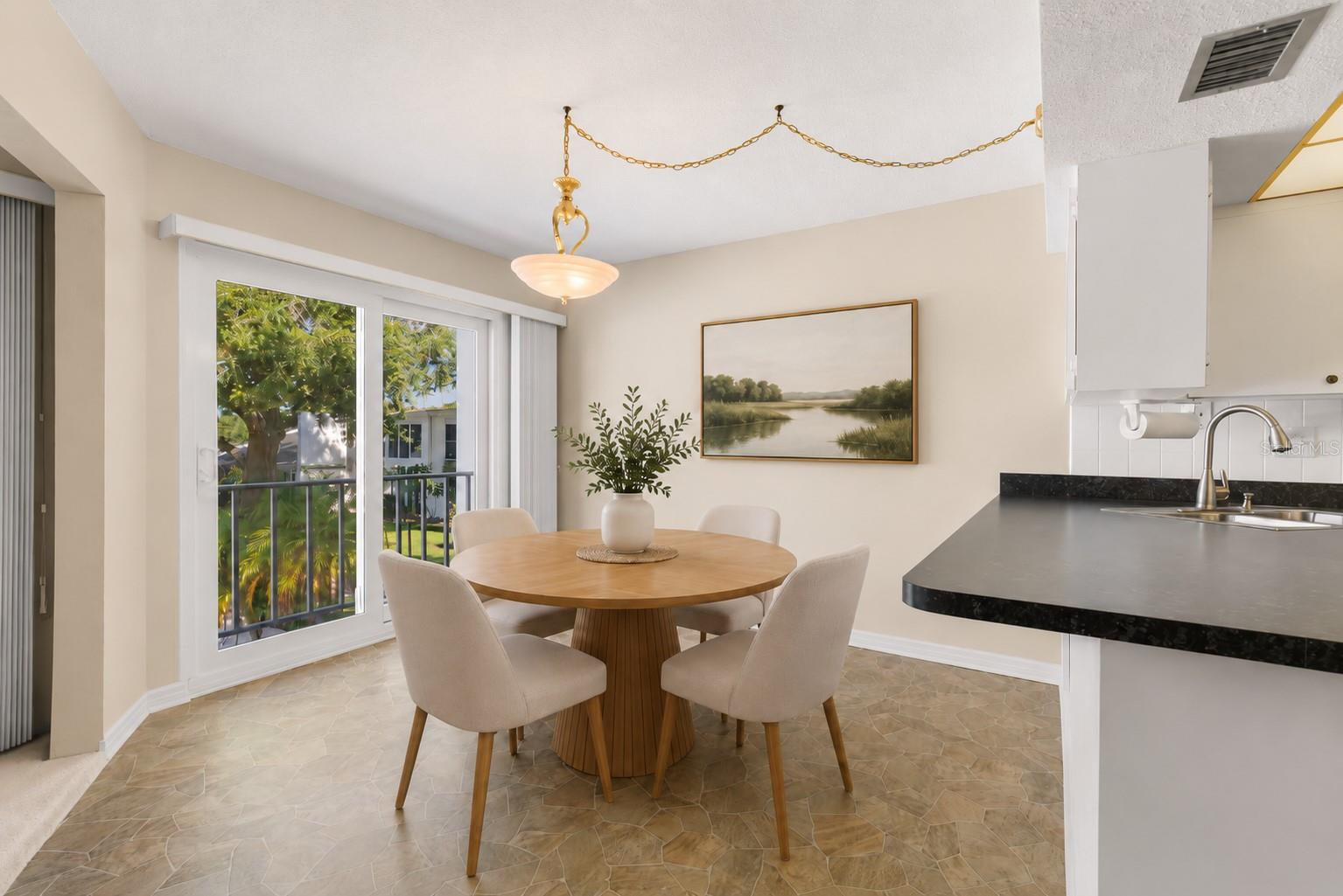 Virtual staging. Dining Room with impact sliders to balcony overlook