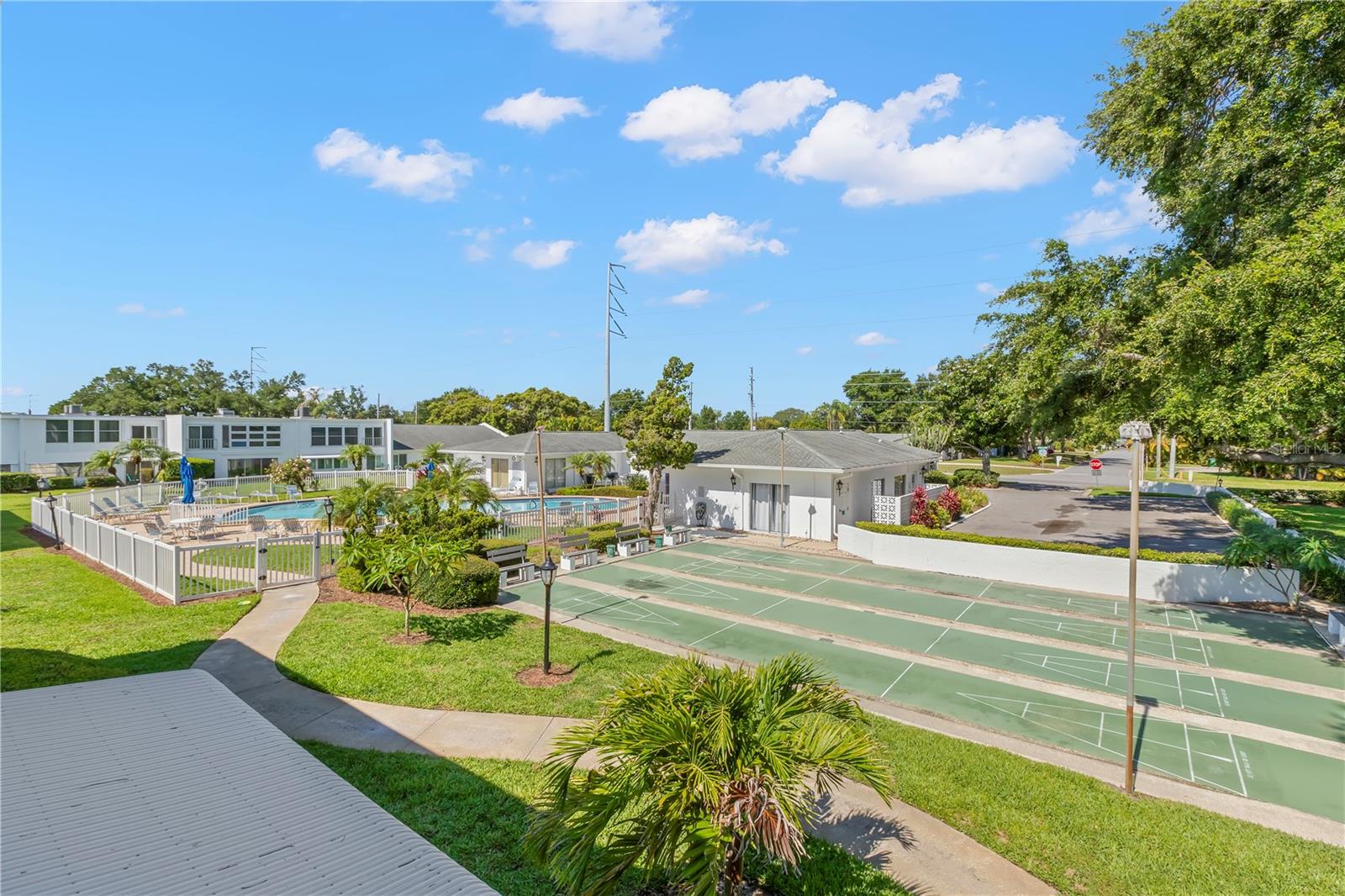 Pool and shuffleboard courts conveniently located right behind your building!