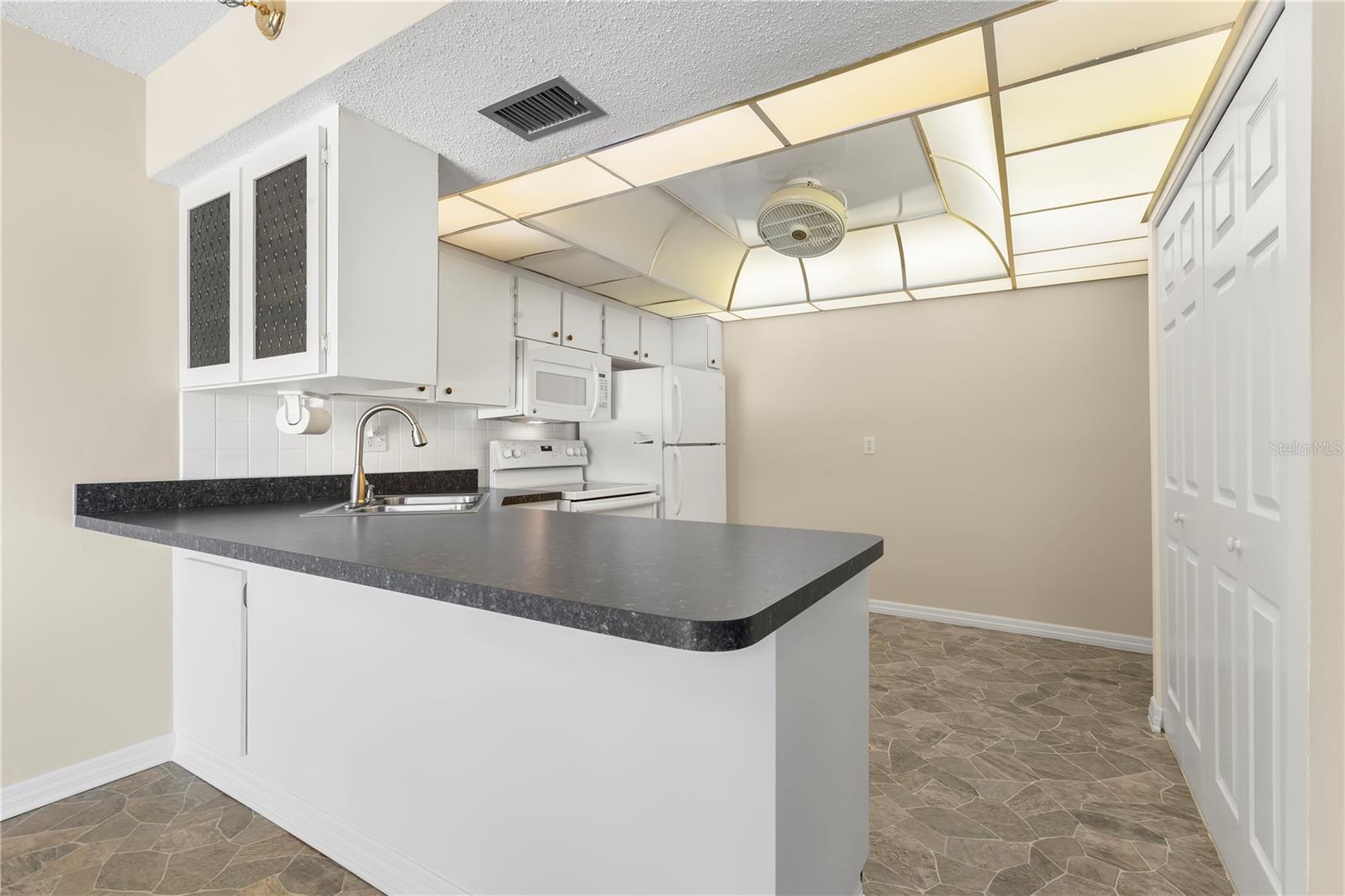 Eat in Kitchen with breakfast bar for barstools