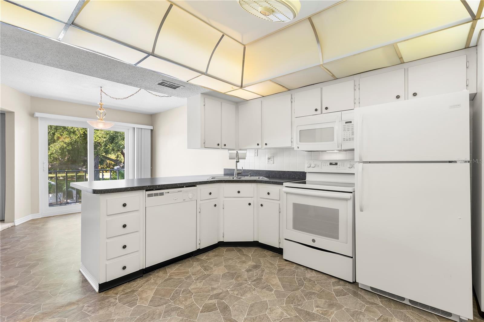 Large kitchen opens to dining room