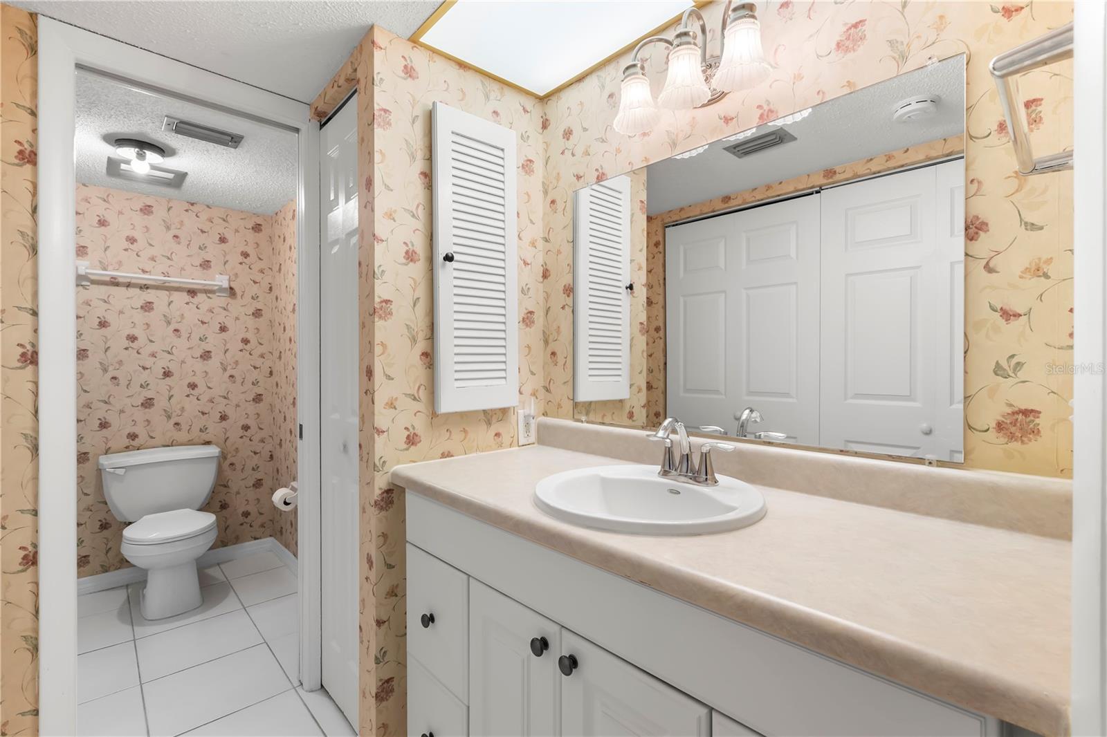 Primary bath with separated vanity area