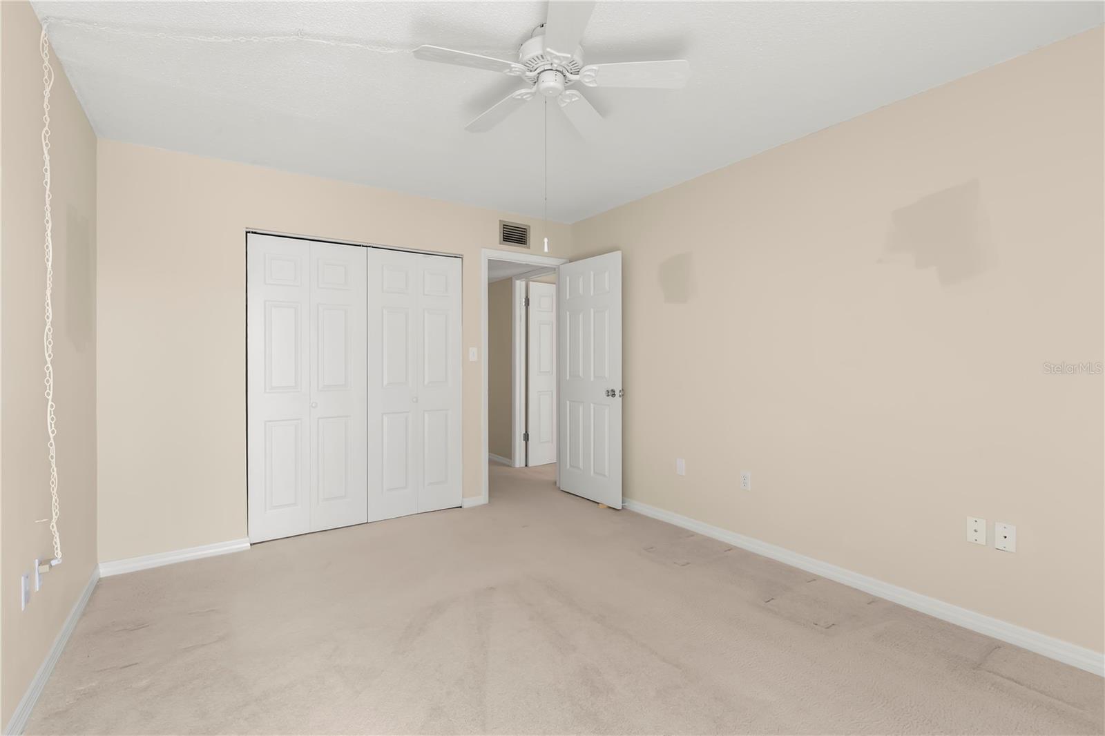 Guest bedroom with built-in closet