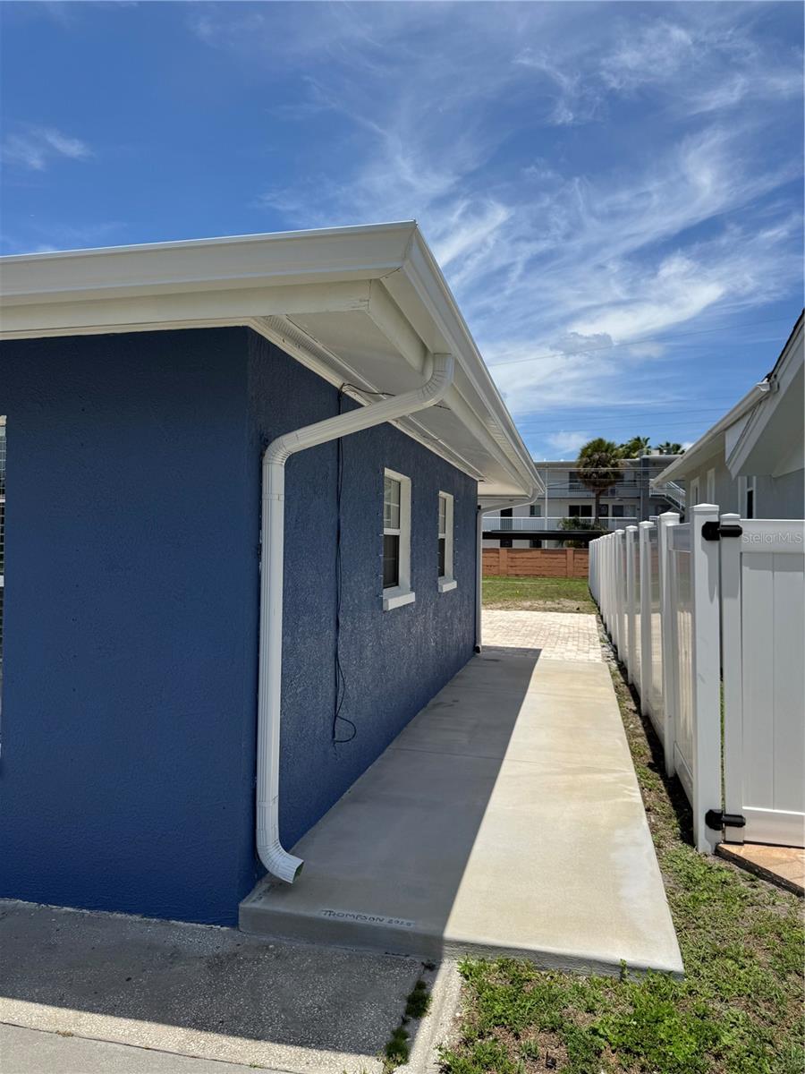 New Gutters and downspouts