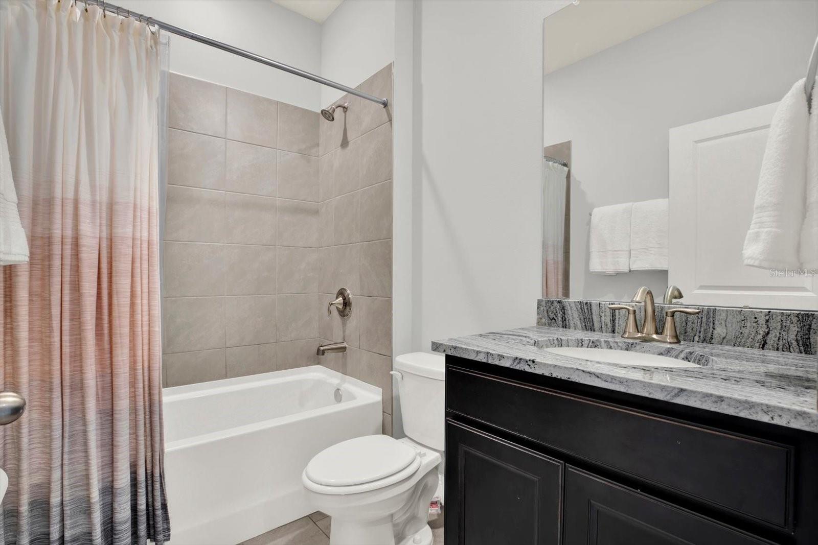 Jack n Jill Bath is shared by bedrooms 2 and 3