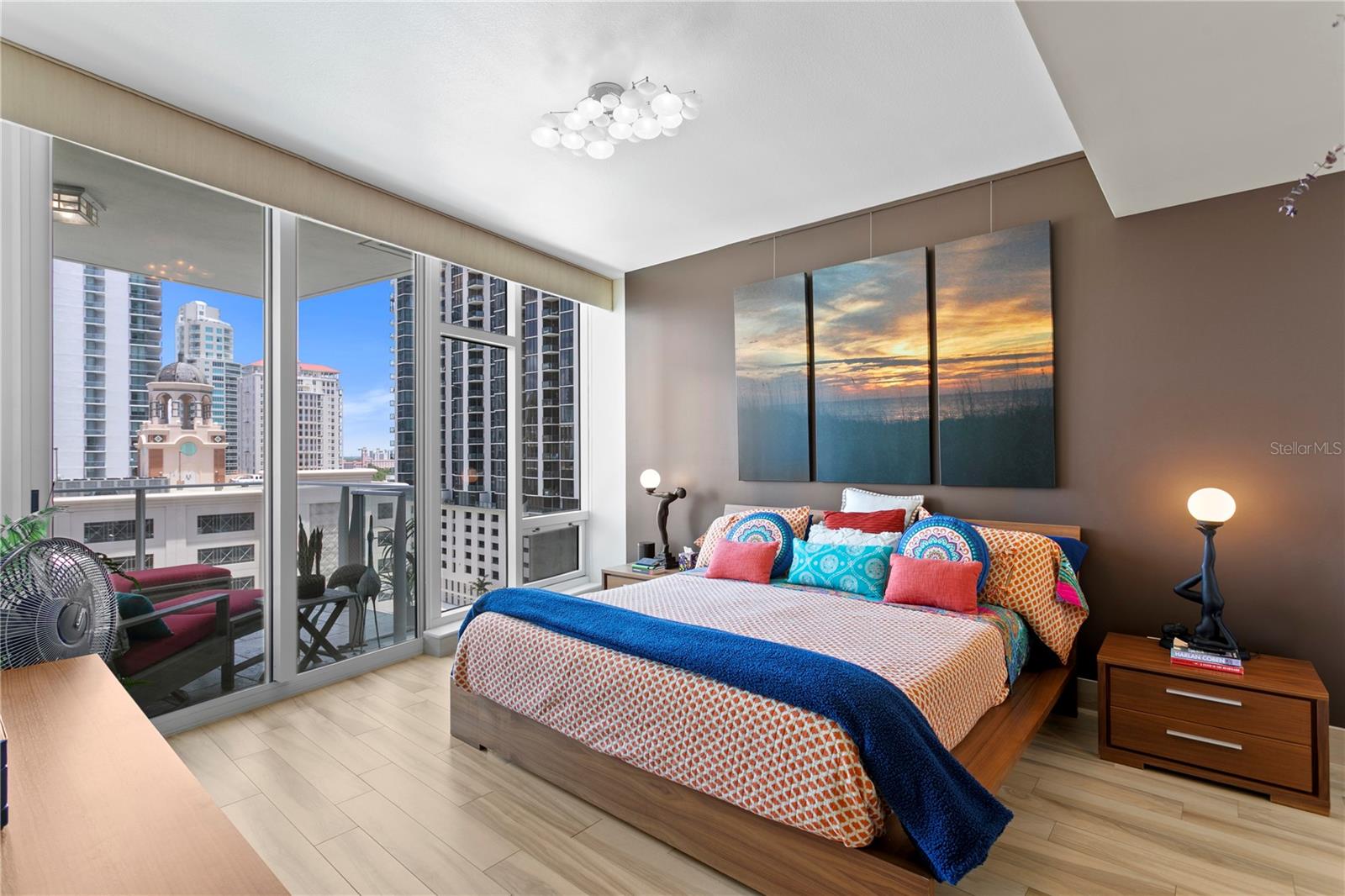 primary bedroom with access to balcony