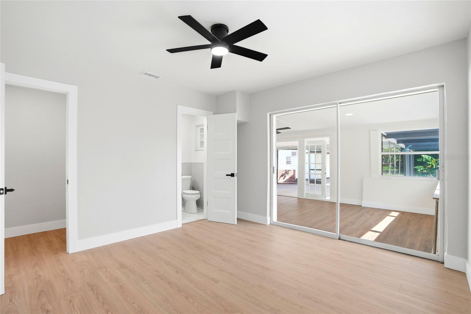 Primary Bedroom with Walk In Closet and En Suite Bath