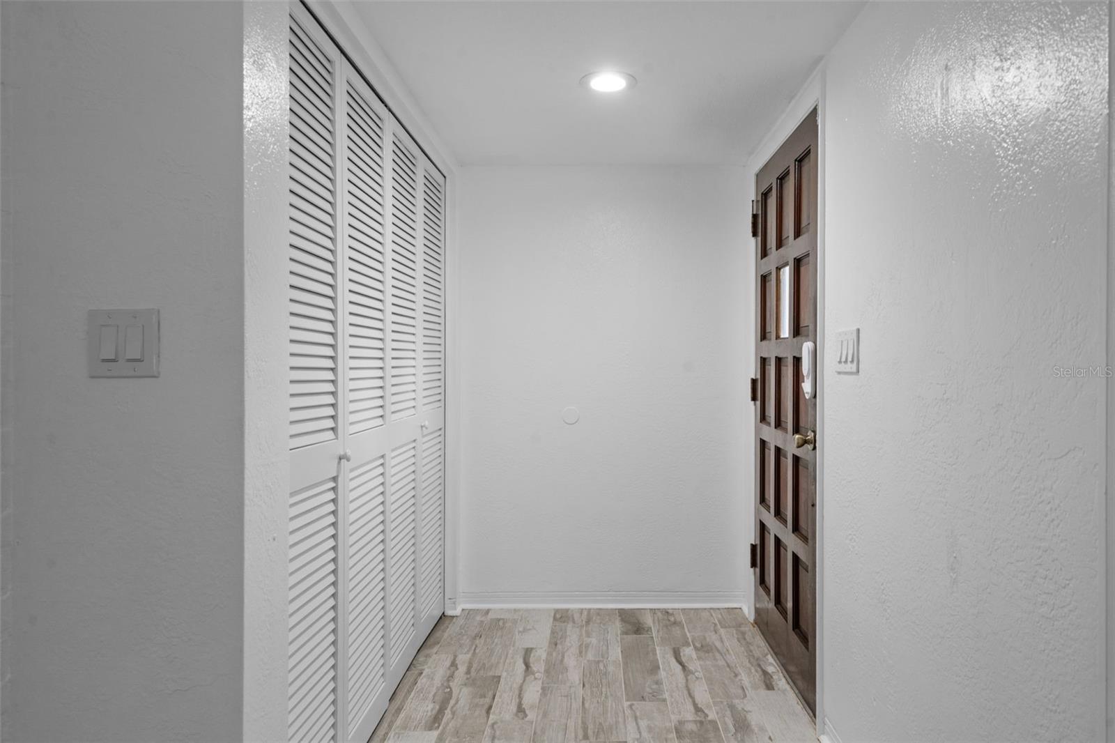 Hall entry with closet