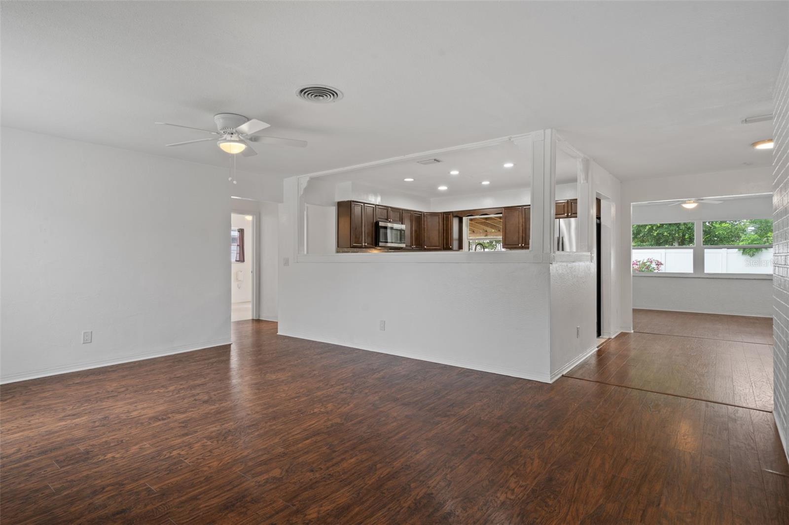 Open to dining rm & family room