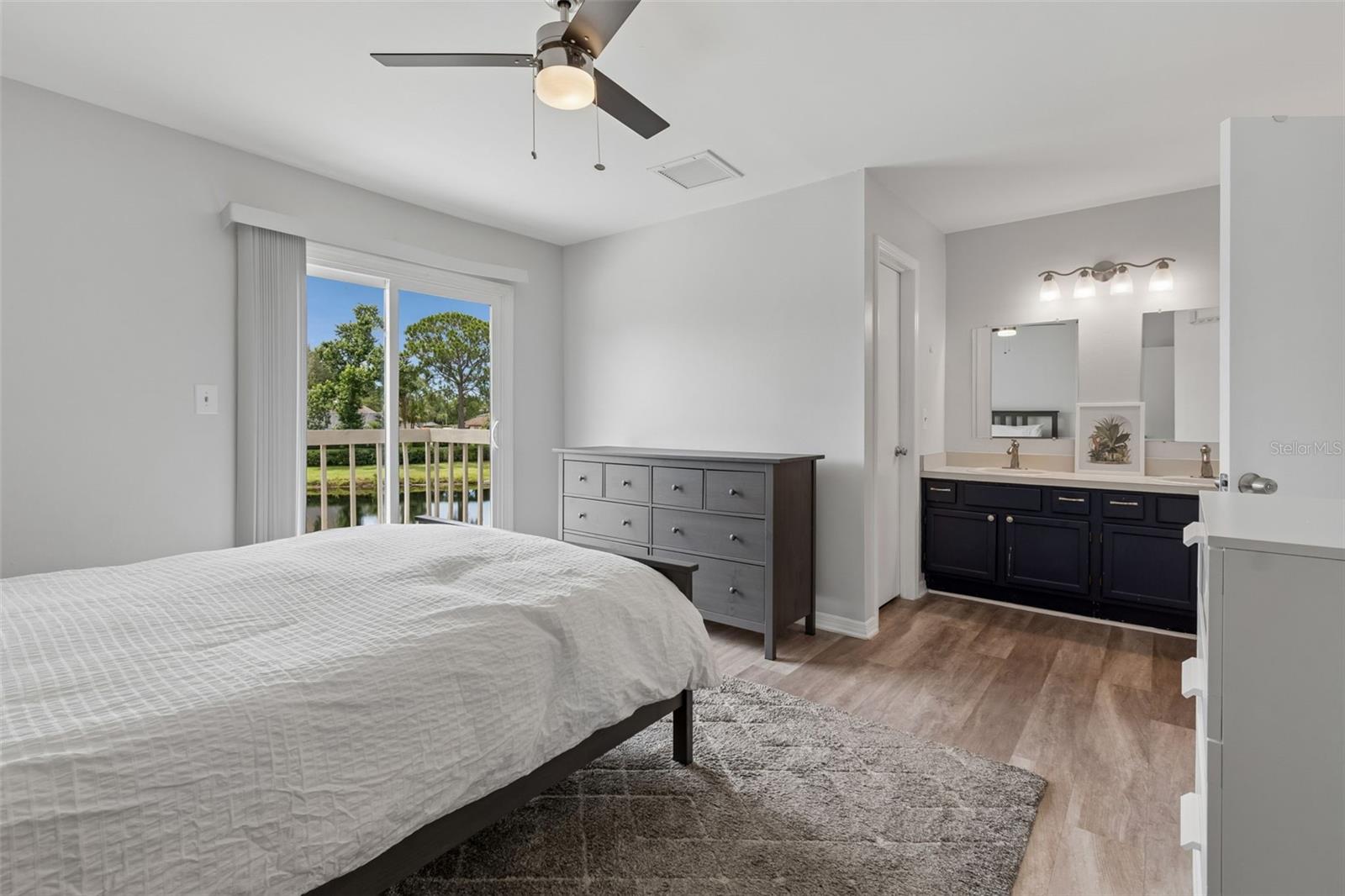 Primary bedroom with pond views
