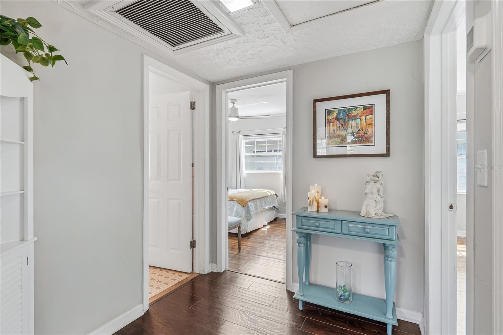 Foyer to two bedrooms in the front of the home.