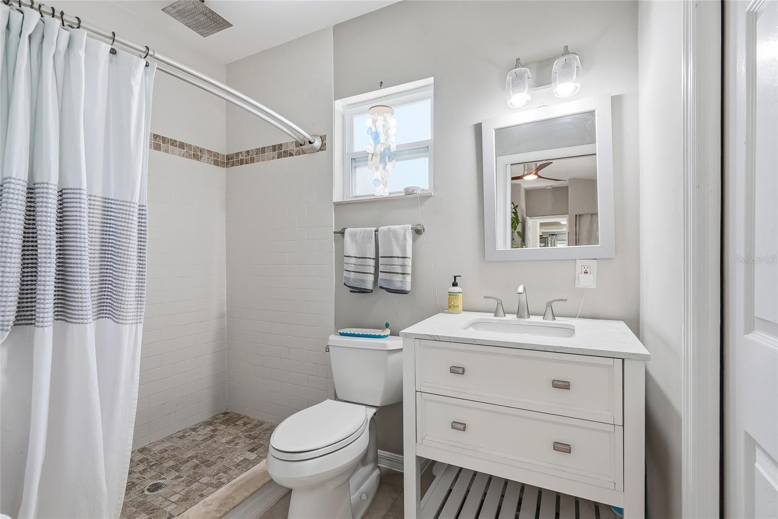 Ensuite bathroom within the third bedroom.