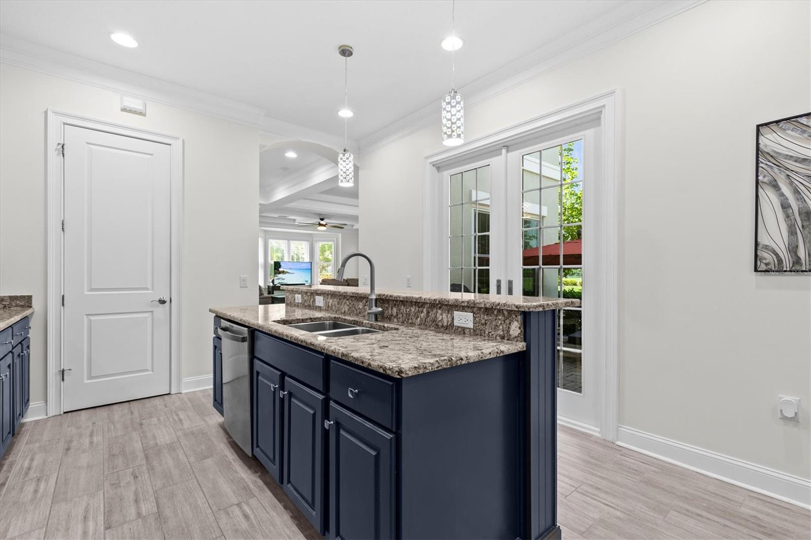 Hurricane rated French Doors lead to outdoor living space.