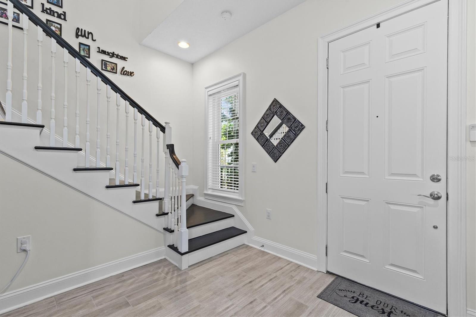 Front door opens to spacious foyer.