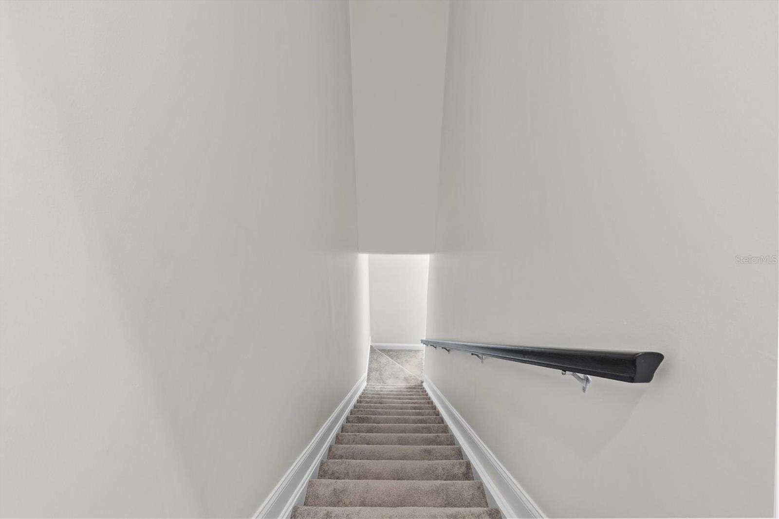 stairs just inside garage door lead to 500 SF studio on 2nd level.
