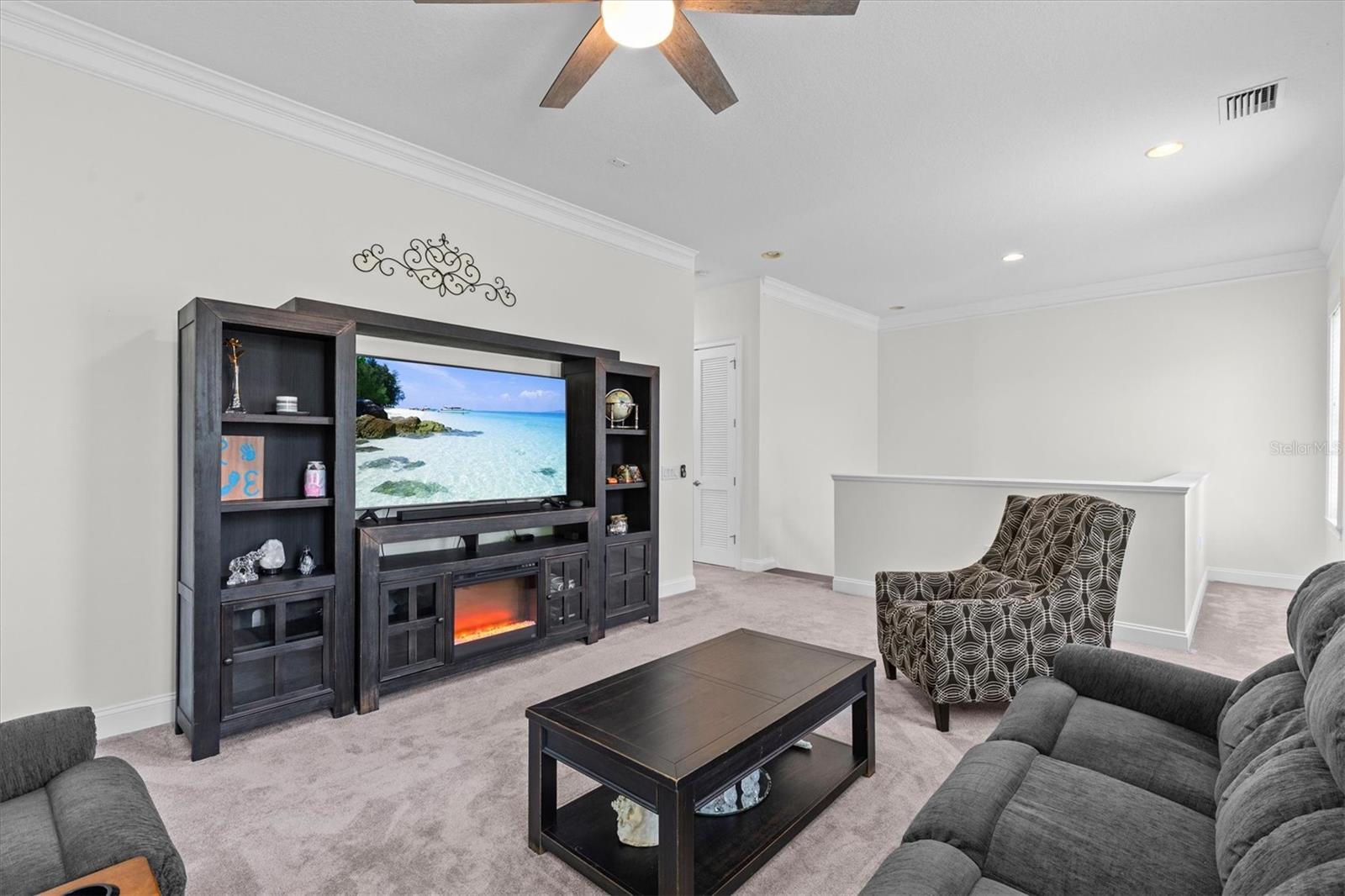 Ceiling has recessed lighting and is pre-wired for speakers.