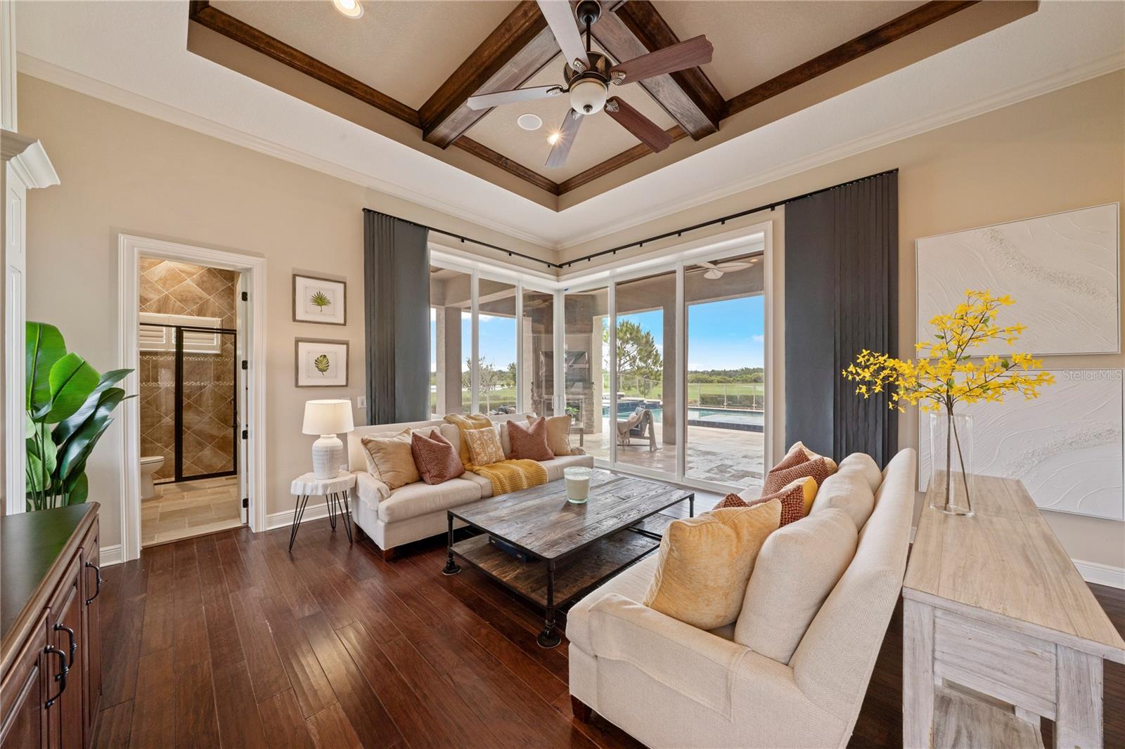 Family room with zero corner pocketing doors