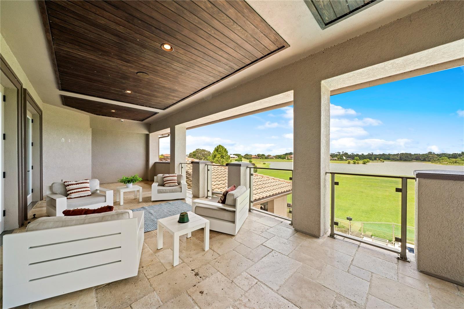 Balcony with glass enclosure for unobstructed lake views