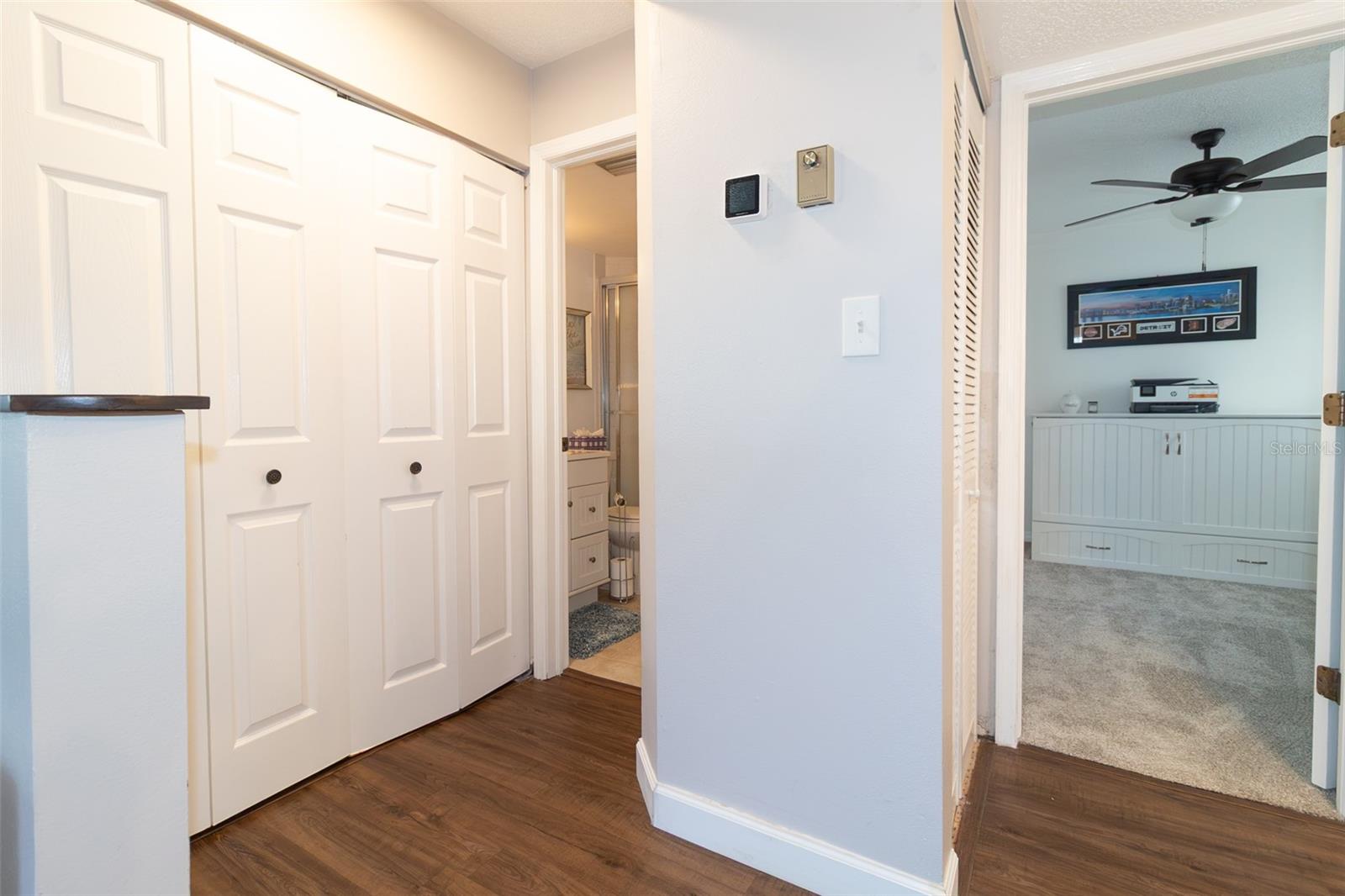 Guest room next to bathroom and laundry closet