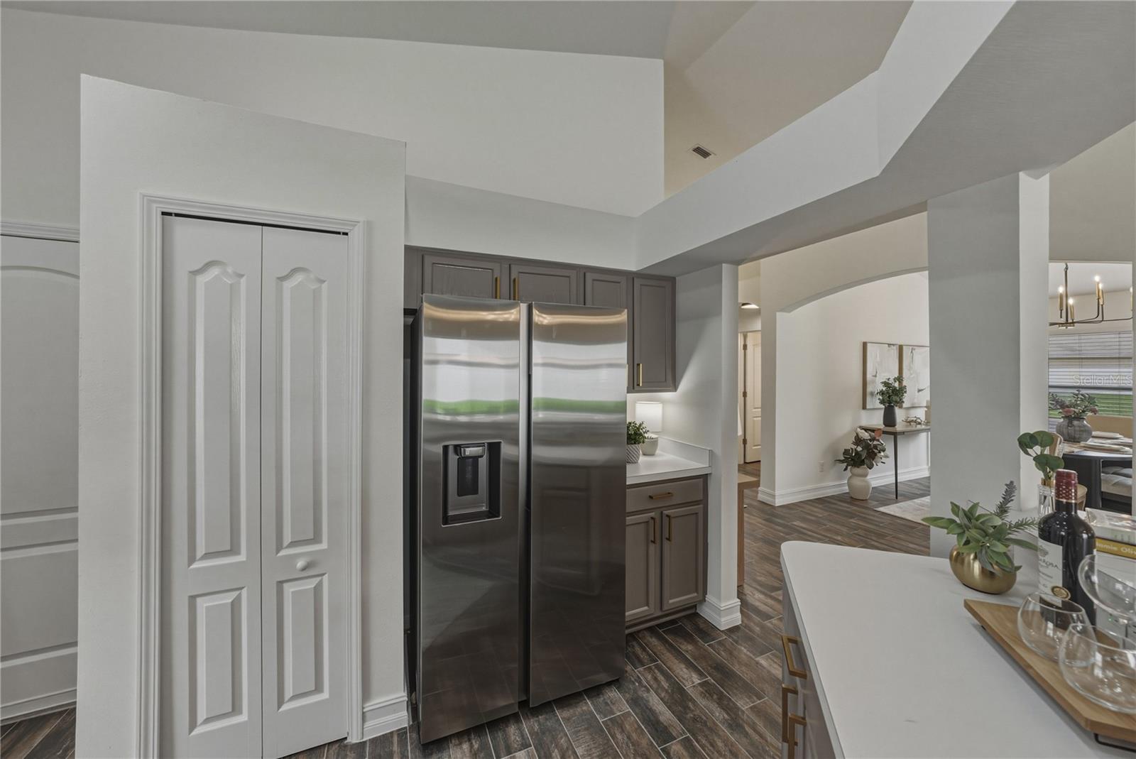 Kitchen with Brand New Sleek Handleless Design Refrigerator