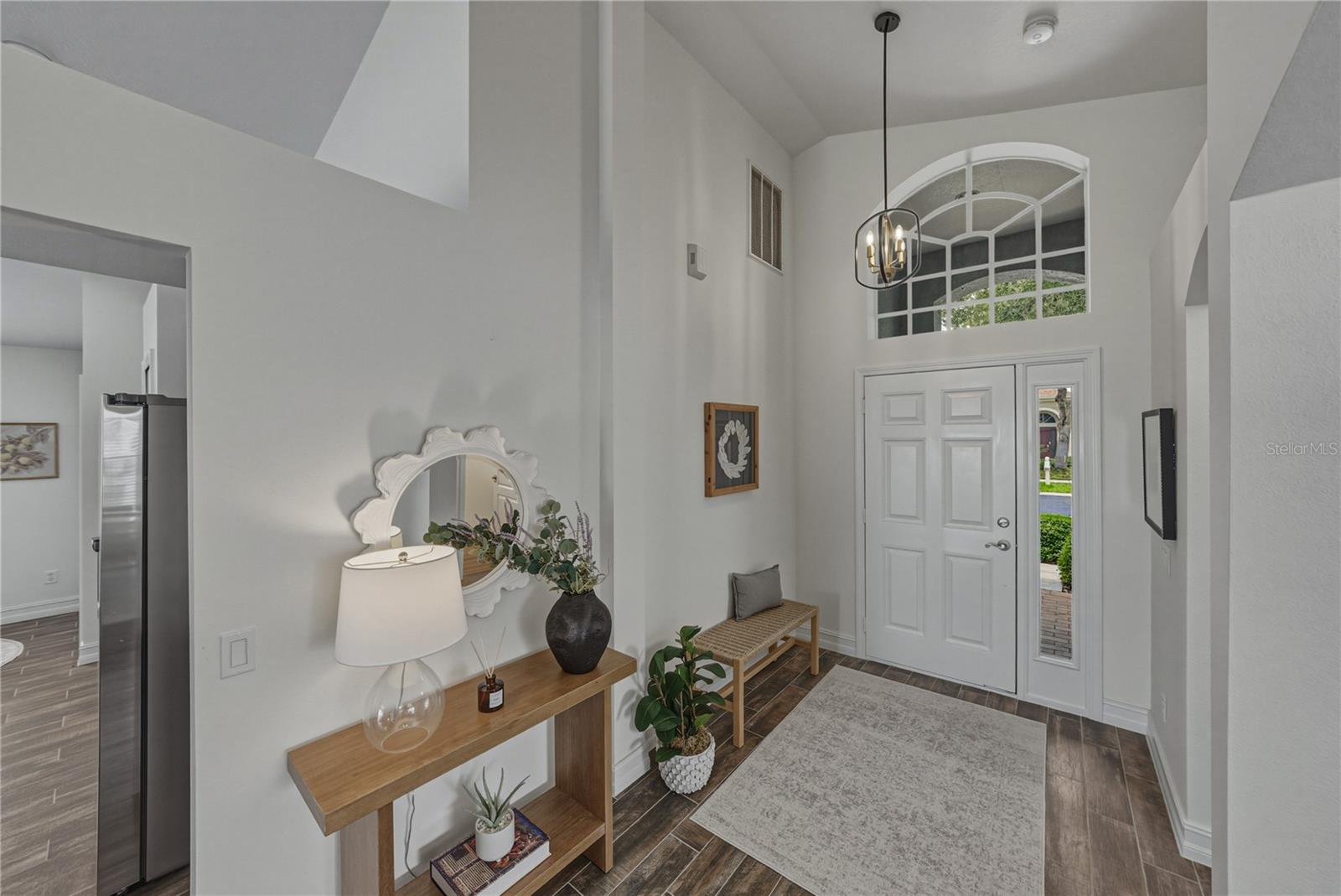 Lovely Foyer with Vaulted Ceilings