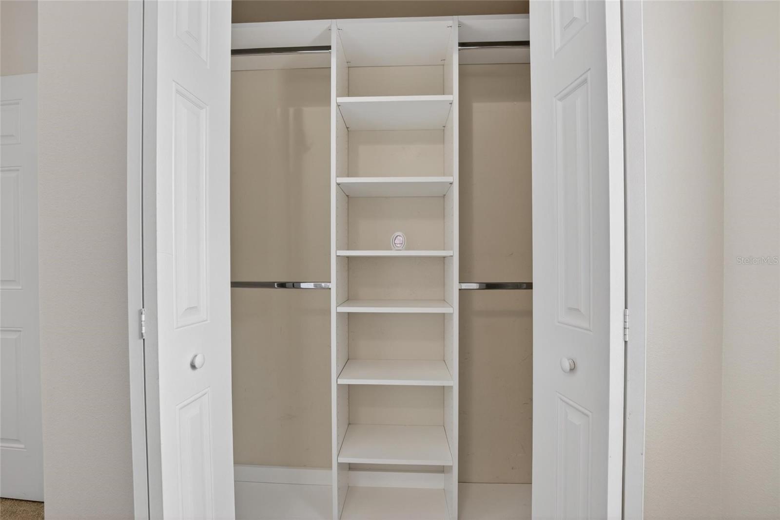 Bedroom 1 closet with built ins.