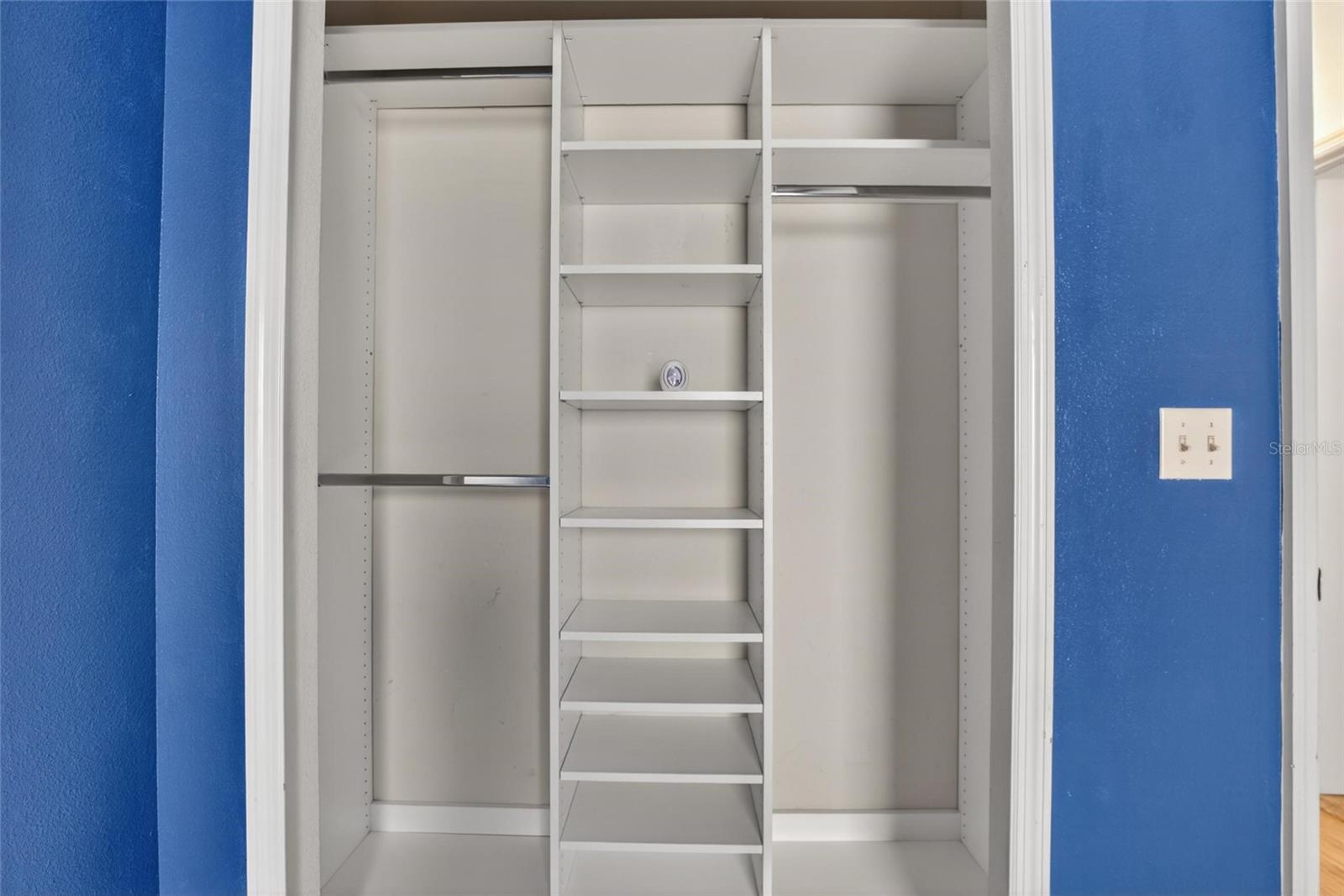 Bedroom 2 closet with built ins.