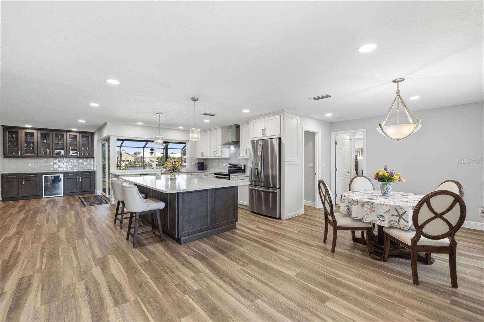 Walking in the Door you see the Water!  Need a wide canal to achieve that! The Water Proof Luxury Vinyl Flooring is top of the line and offered what is called Pet Lock.  Each piece is connected in a way to not allow any liquid to go between the planks!