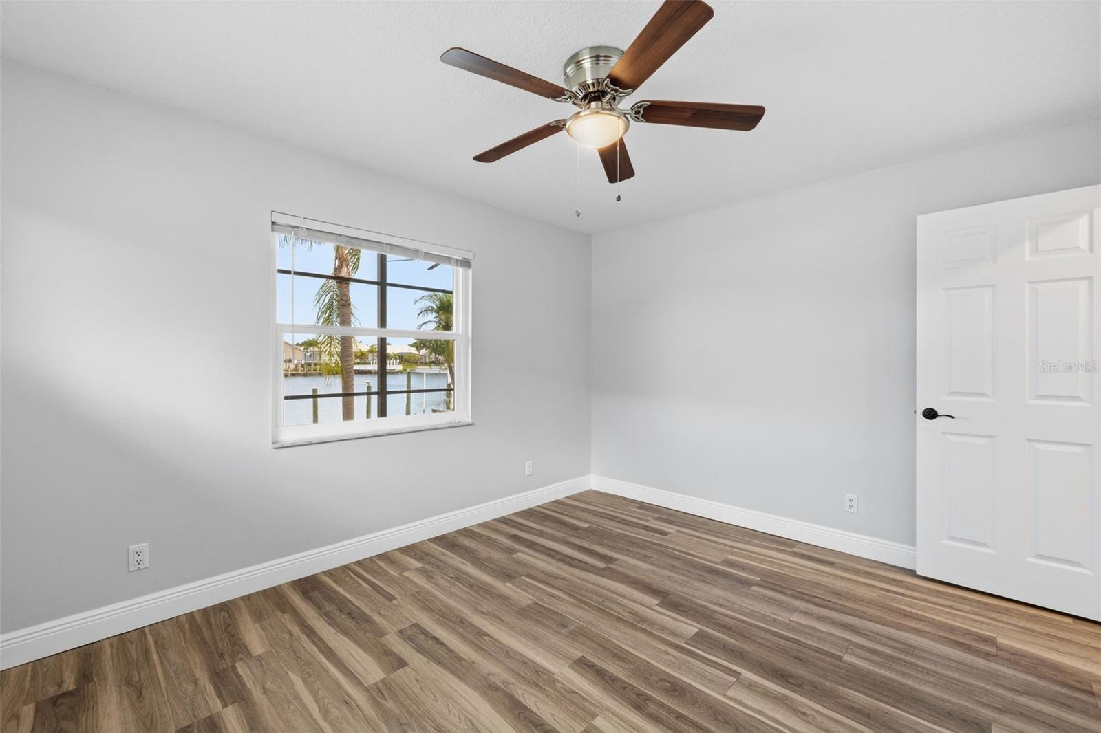 Bedroom 2 has a window overlooking the water! Where the Bed is typically placed you will wake up to Water Views!