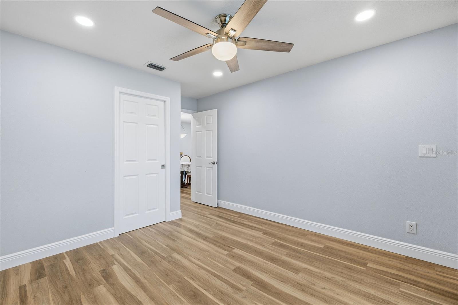 Bedroom 4 or Amazing Office! Extra LED Lighting and a Closet outfitted with Shelves!