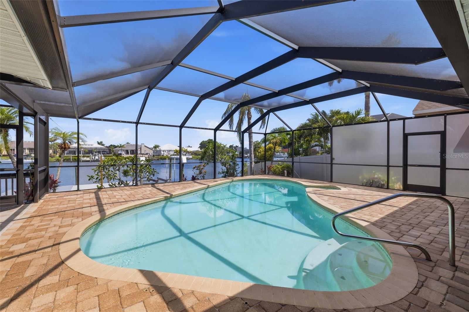 Screening is Upgraded to No Seeum Grade so you can have your sunset party without being bitten by bugs! That Opaque Screening is Florida Glass and it offers privacy for the Pool and Hot Tub!