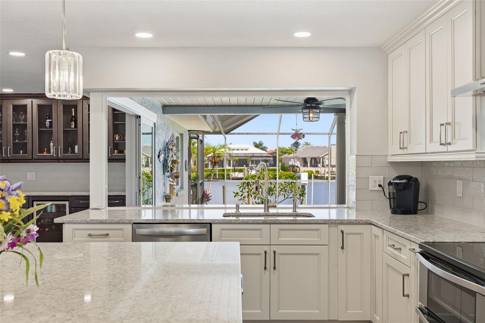 The Service Double Pane Window also pockets for ease to serve the Pool area! Dishes don't appear to be a chore!