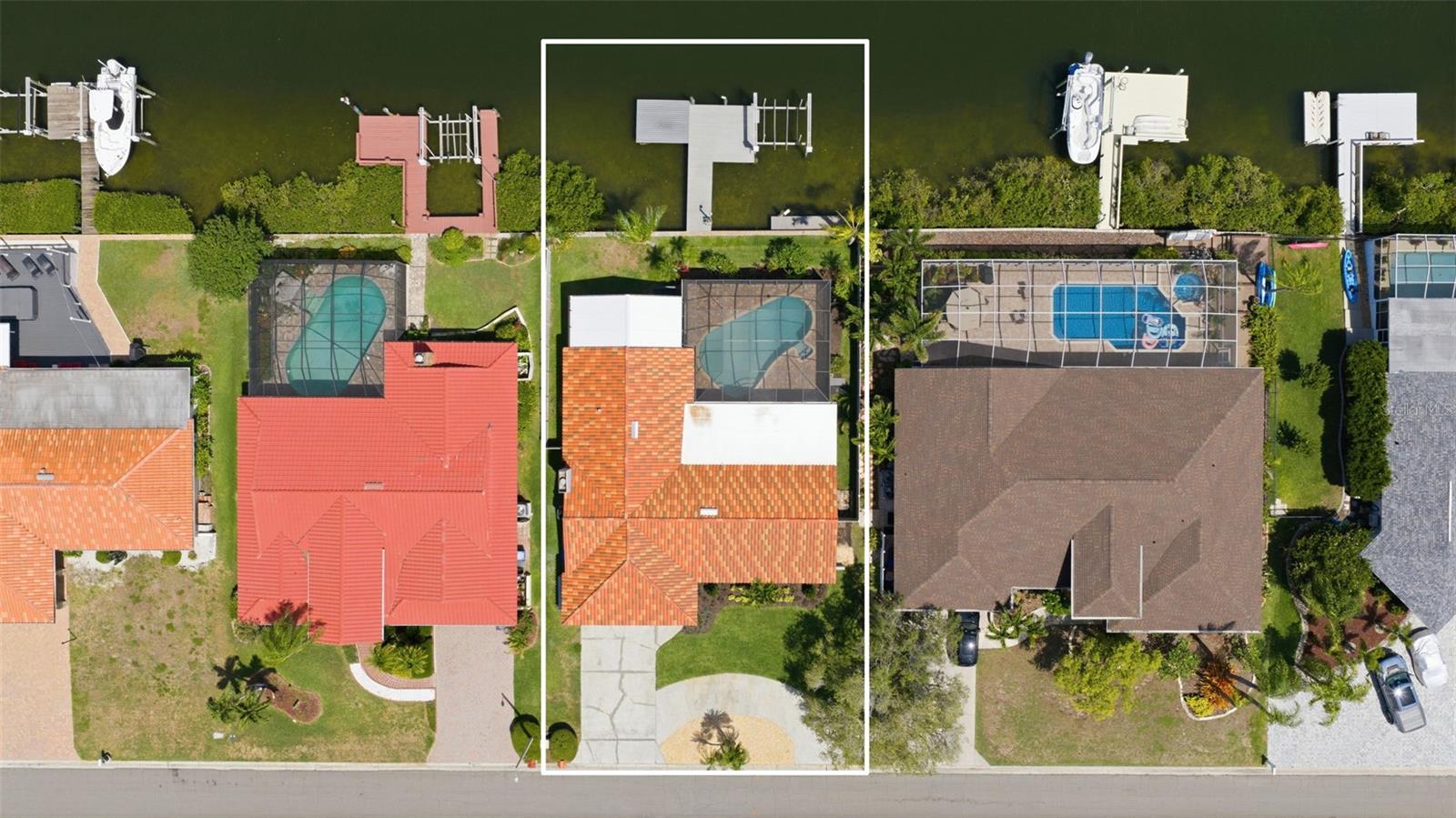 All Roofs are New as of September 2025! Clay Tile Roof from Spain! New TPO Roof over Lanai area & New Vaulted Insulated Roof over Extended Screen Room!