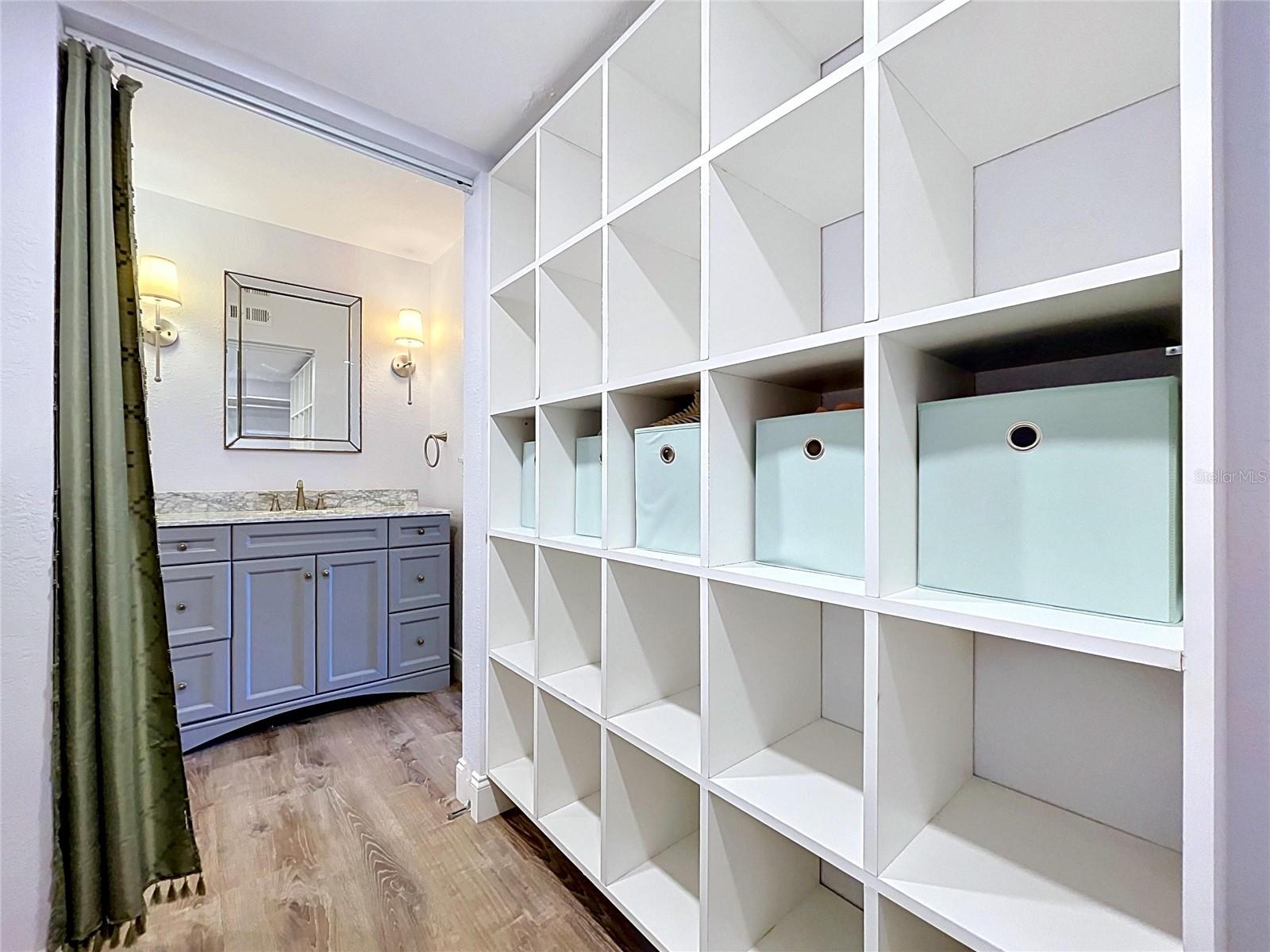 Walk-in closet with 2nd bathroom sink
