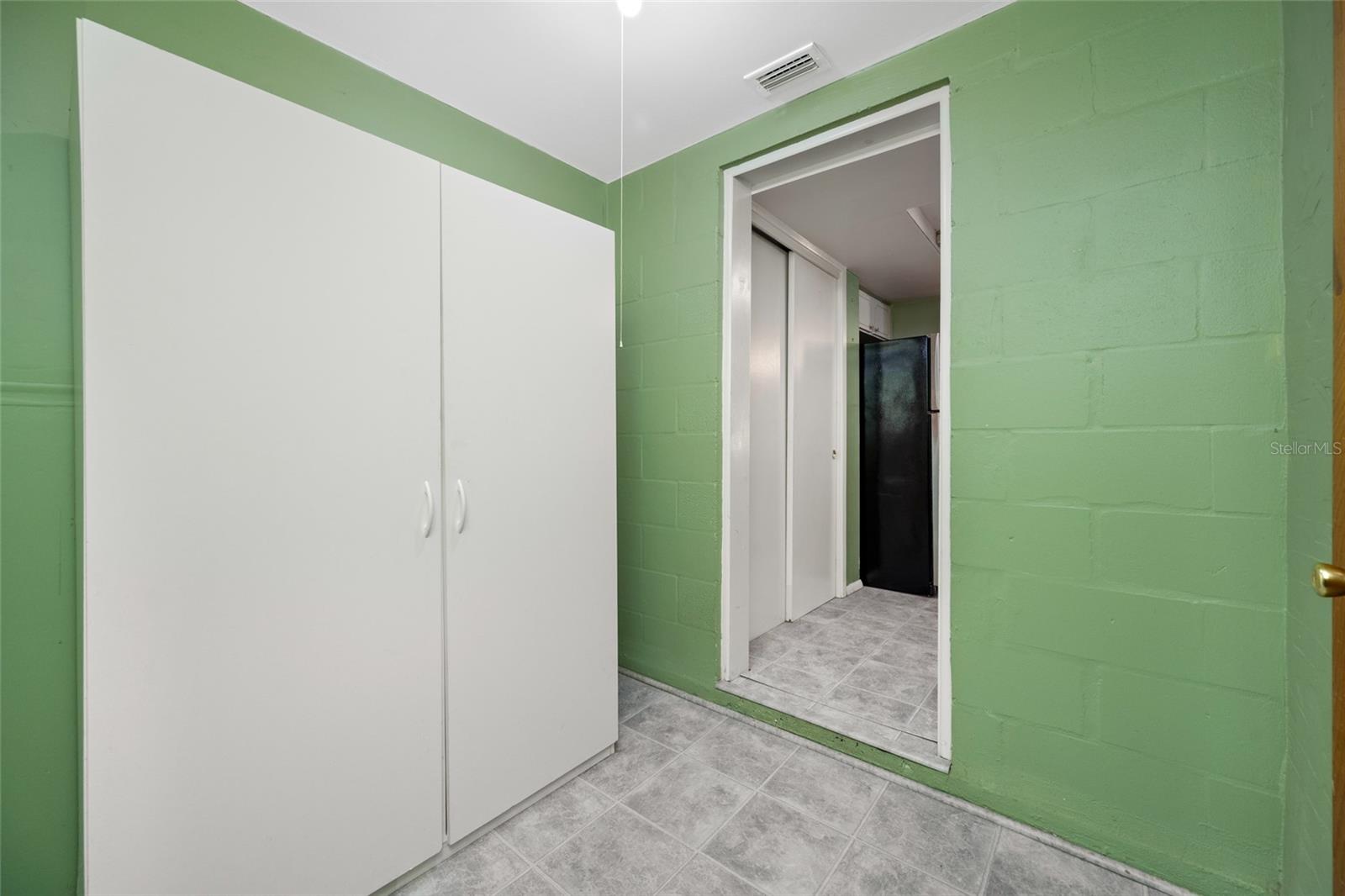 Doorway from kitchen to mud room & 2nd bathroom